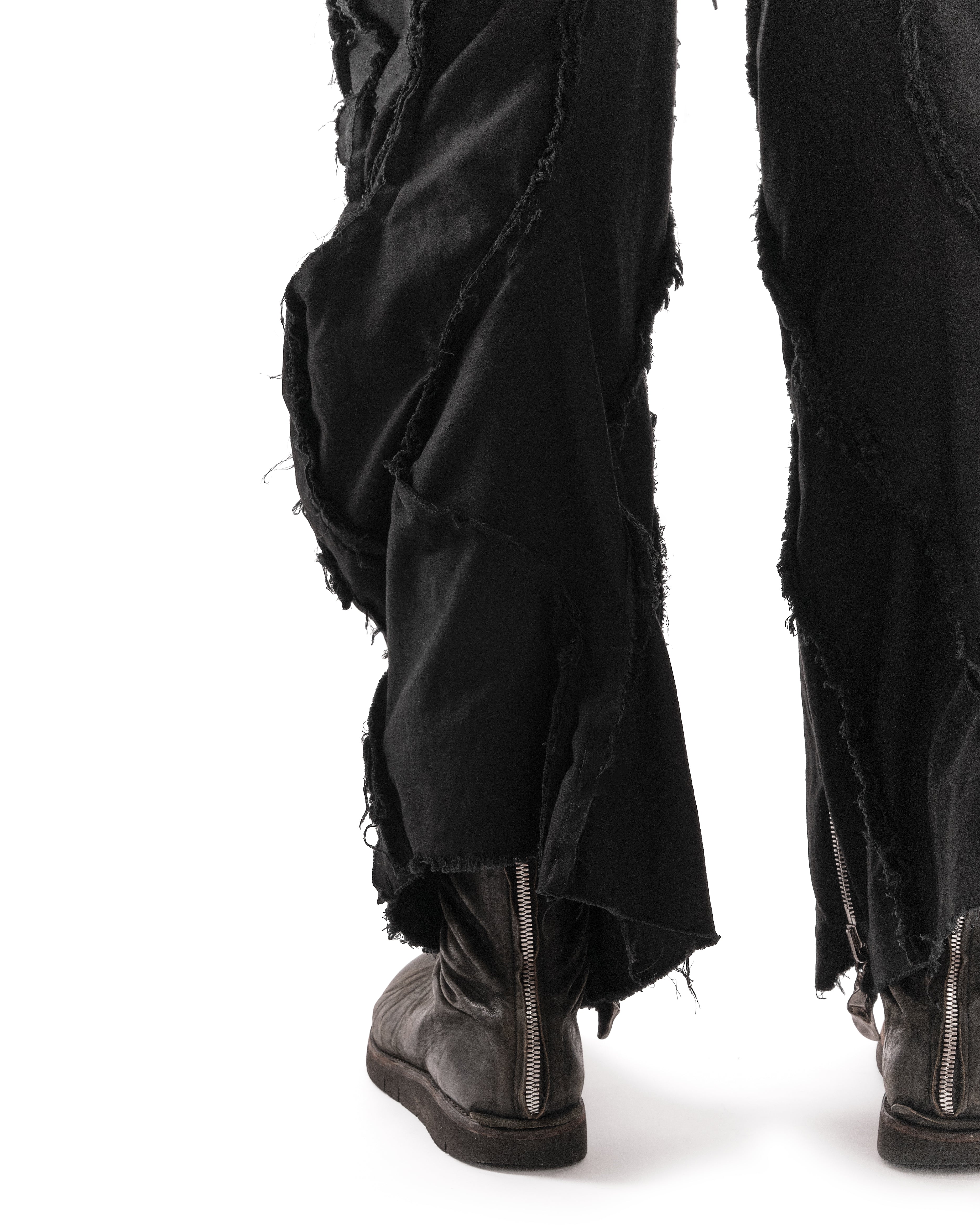 BLACK METAMORPHIC POST HUMAN PANTS