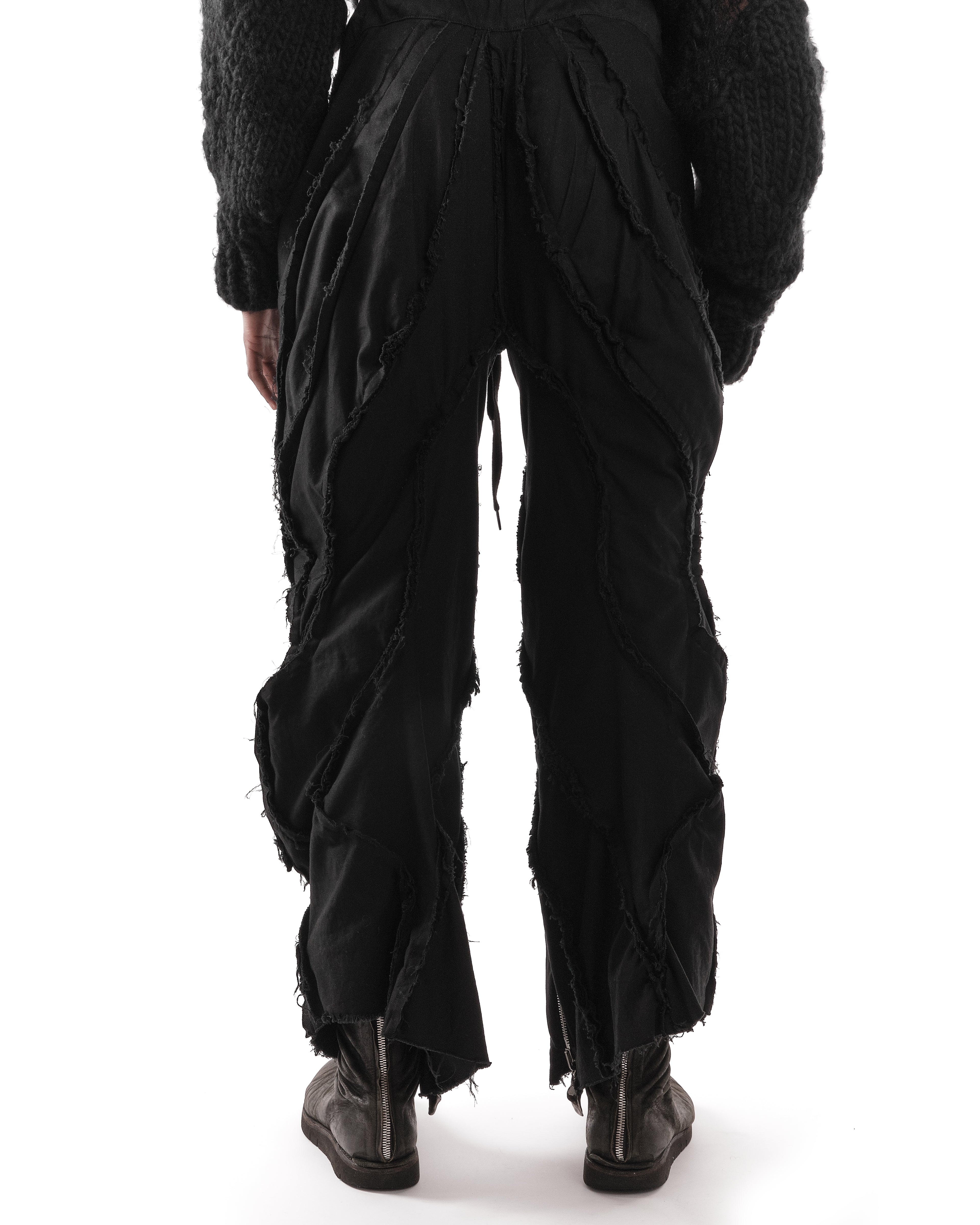 BLACK METAMORPHIC POST HUMAN PANTS