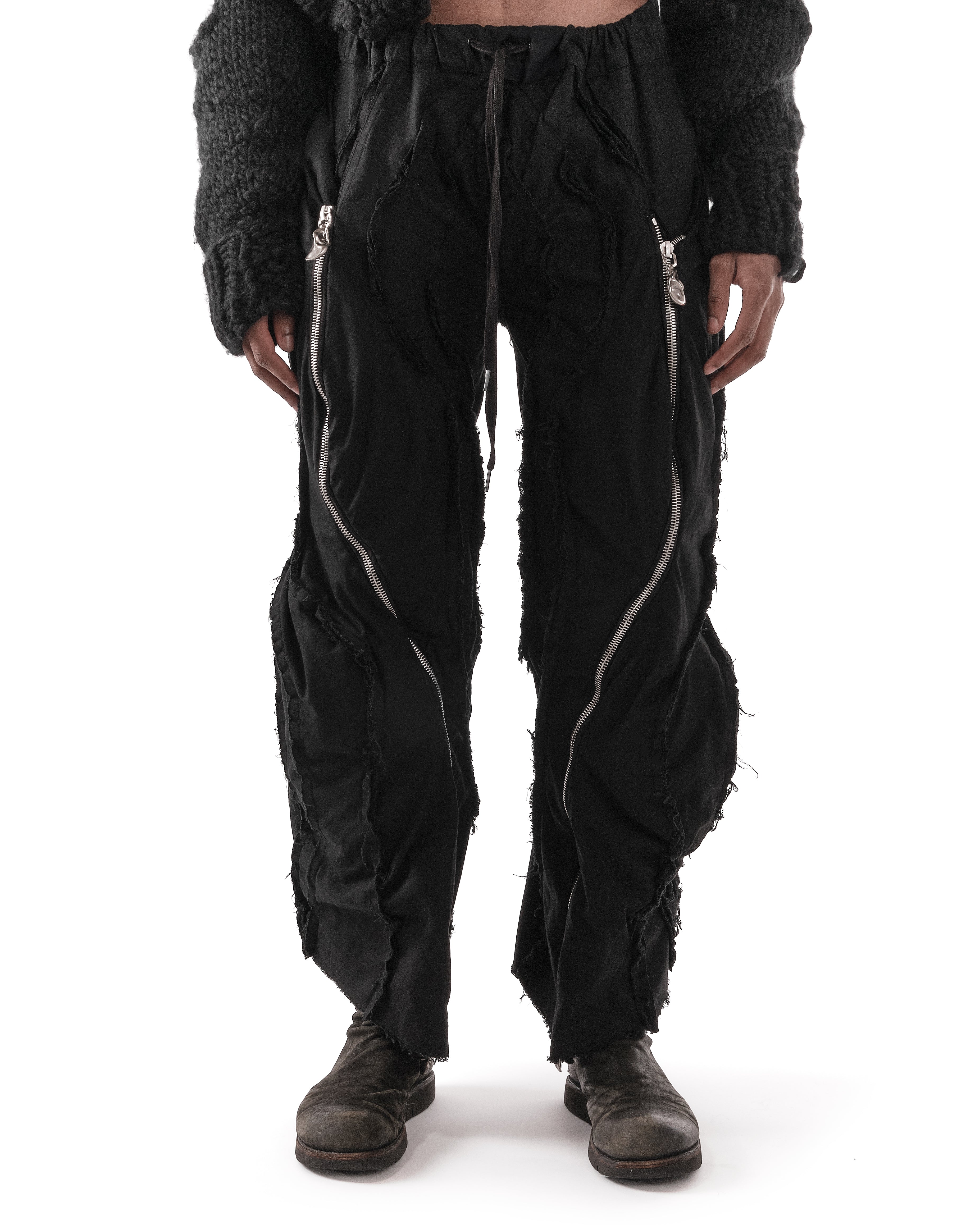 BLACK METAMORPHIC POST HUMAN PANTS