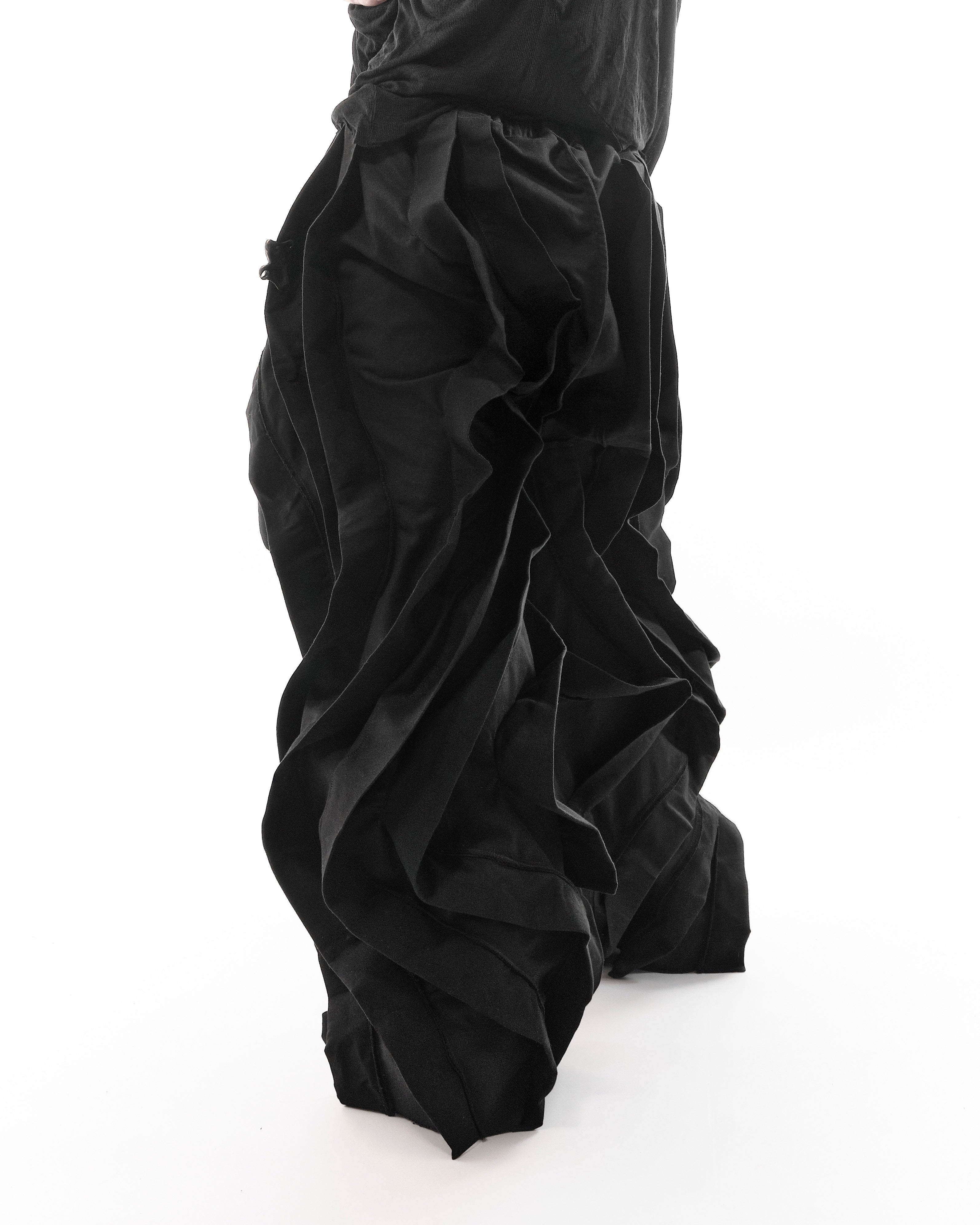 ALL BLACK REVERSIBLE POST HUMAN PANTS