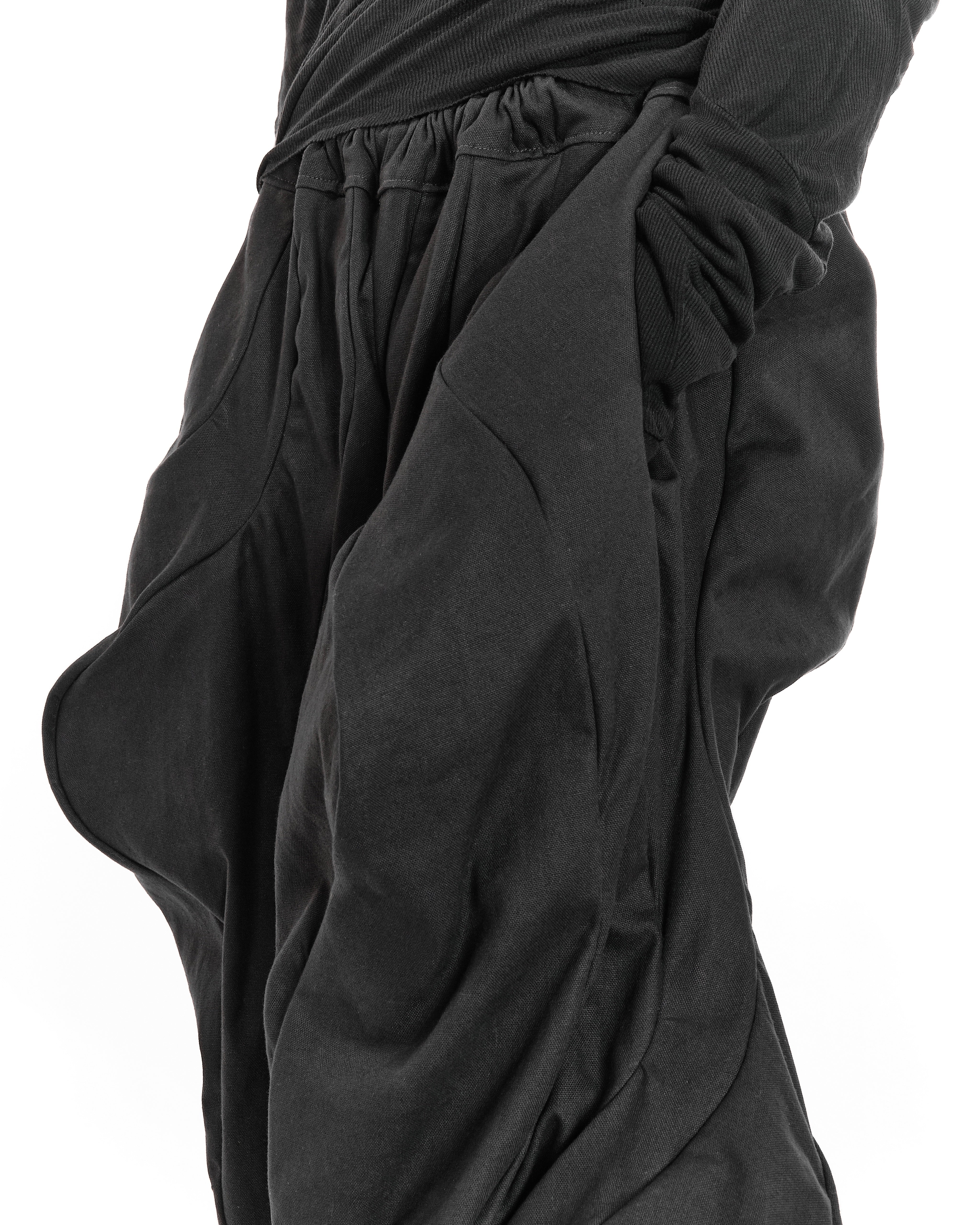 ALL BLACK REVERSIBLE POST HUMAN PANTS