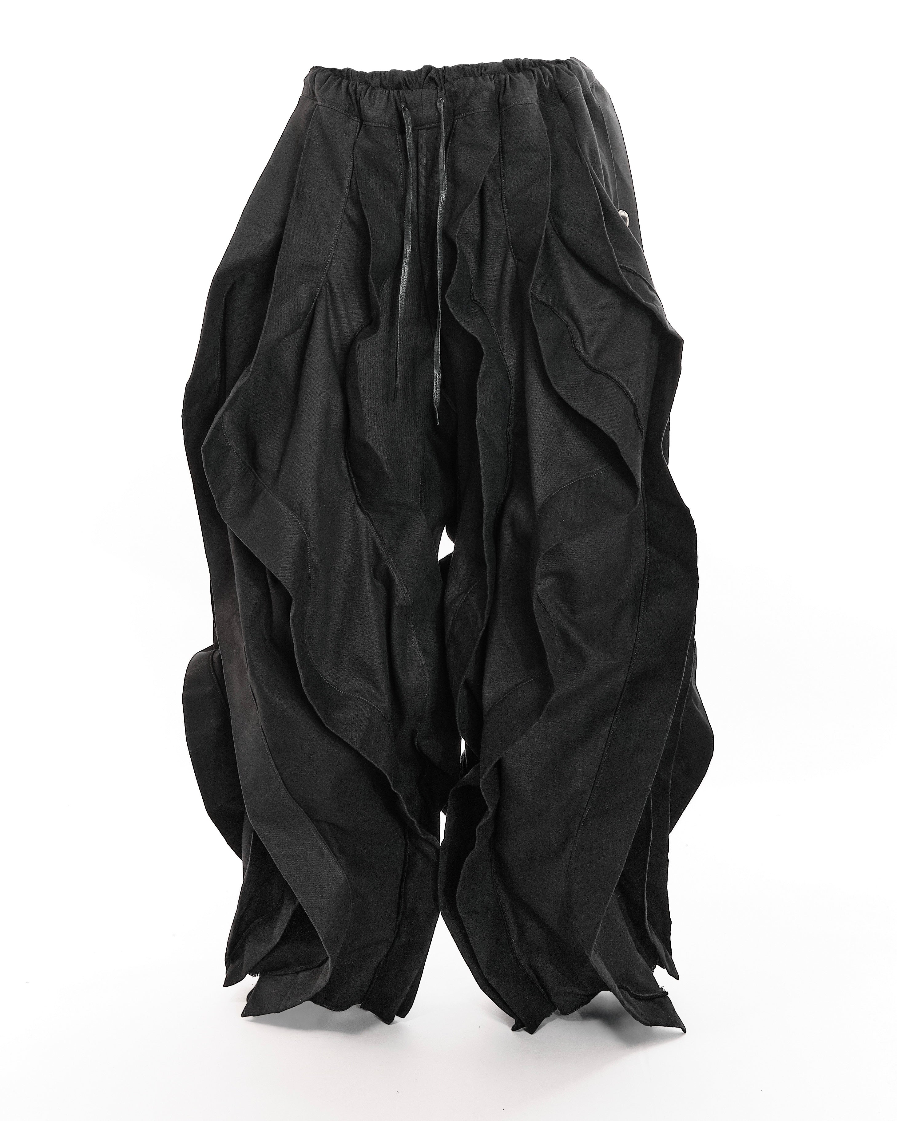 ALL BLACK REVERSIBLE POST HUMAN PANTS