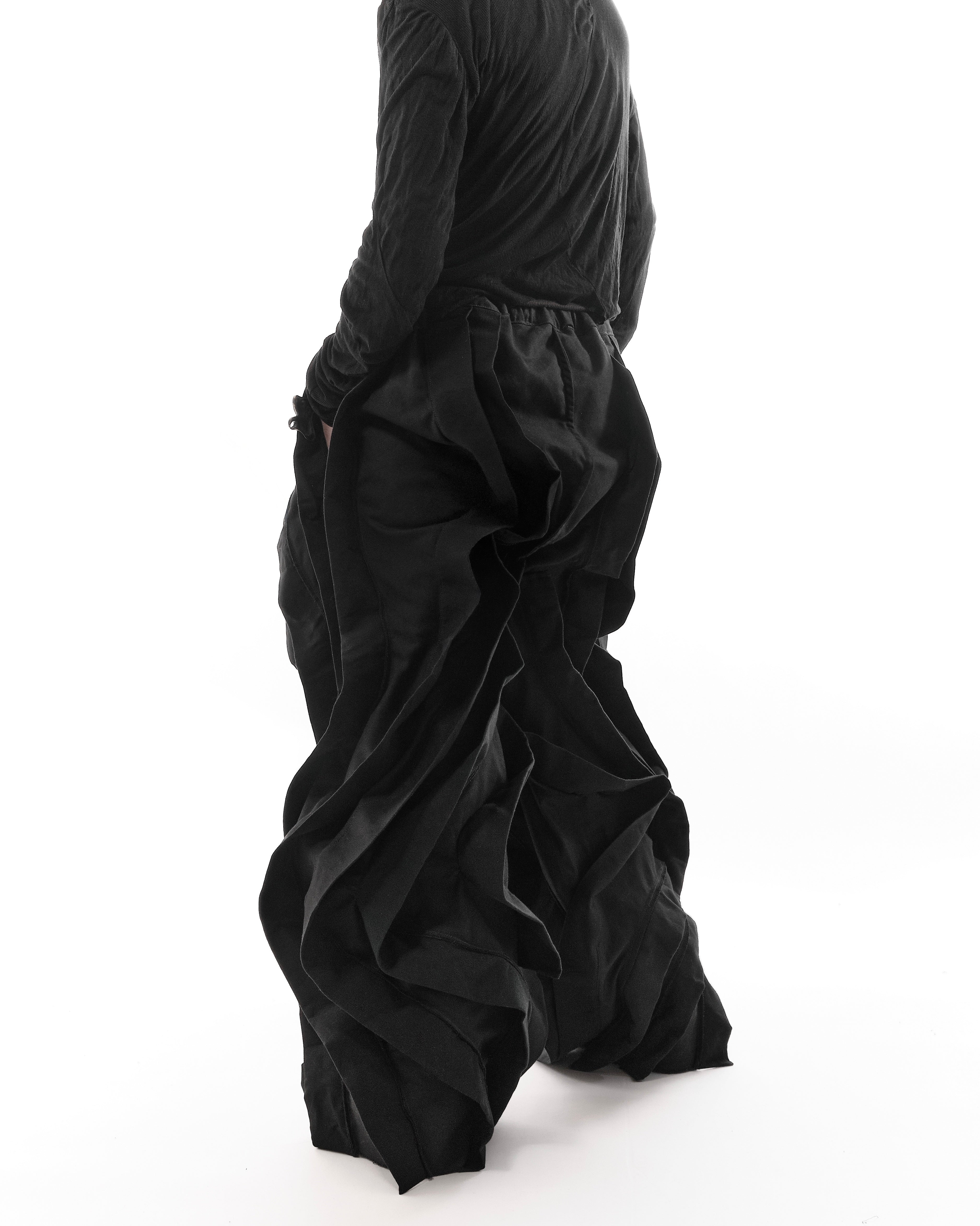 ALL BLACK REVERSIBLE POST HUMAN PANTS