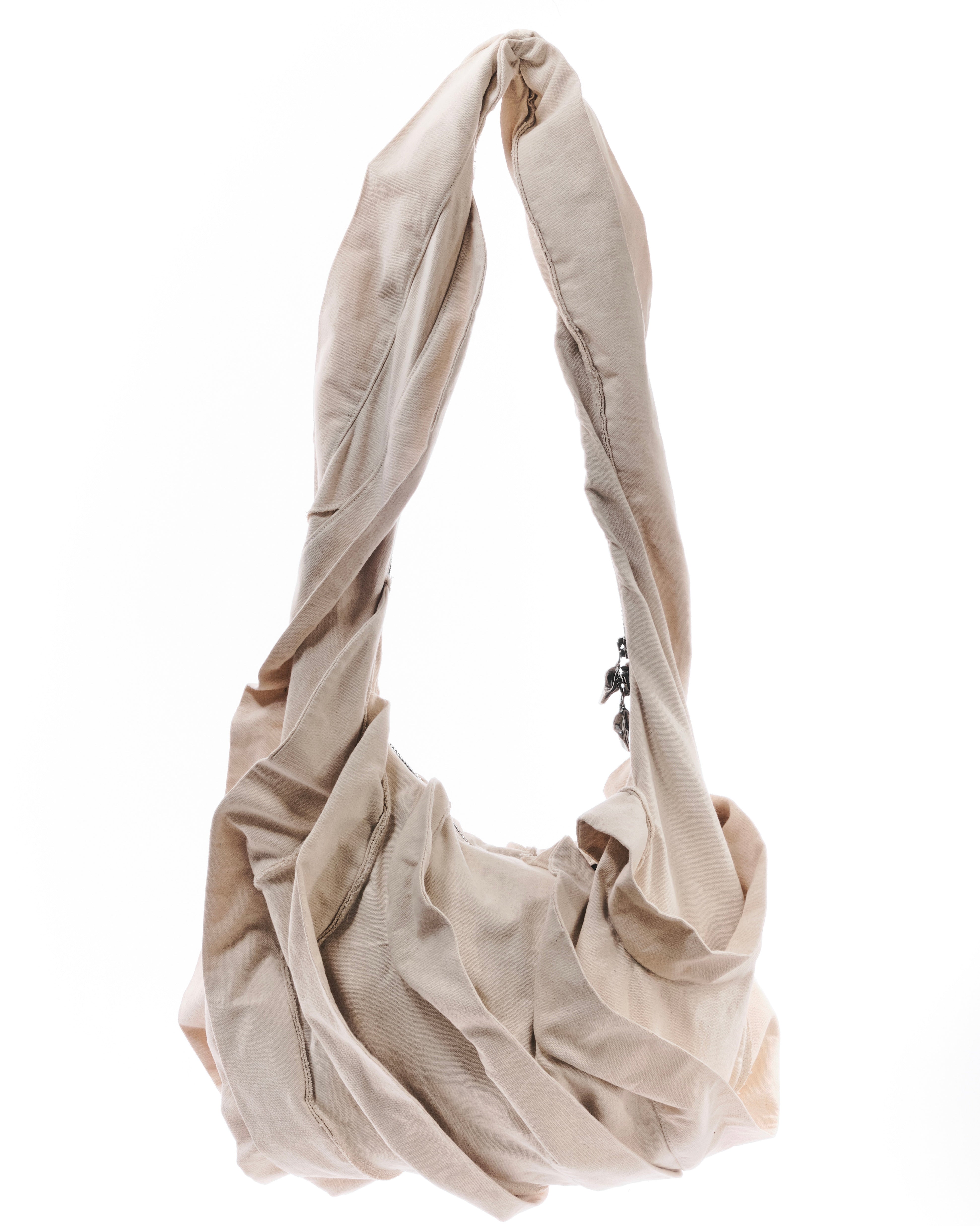 Beige shoulder bag on a white background