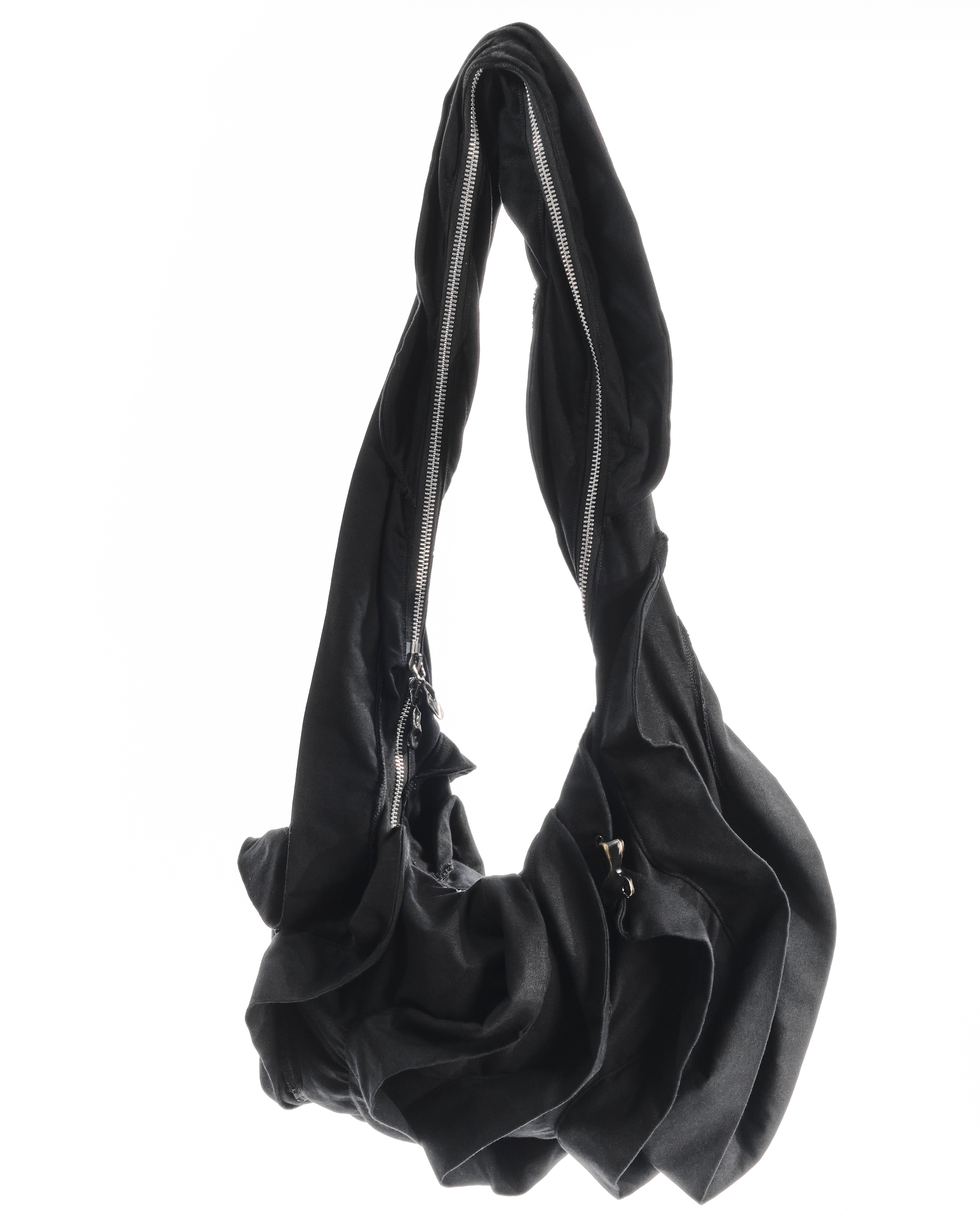 BLACK REVERSIBLE CARAPACE BAG