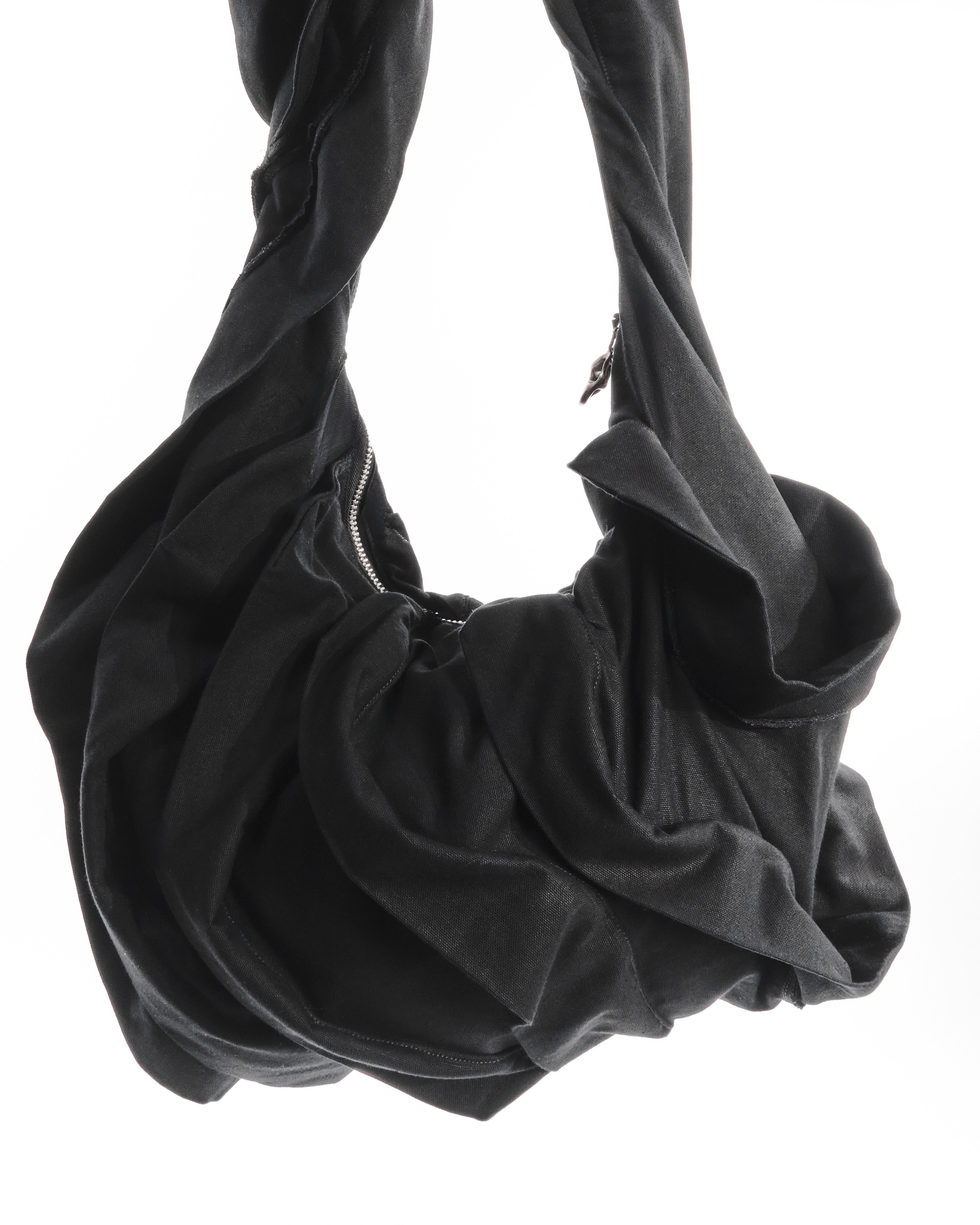 BLACK REVERSIBLE CARAPACE BAG