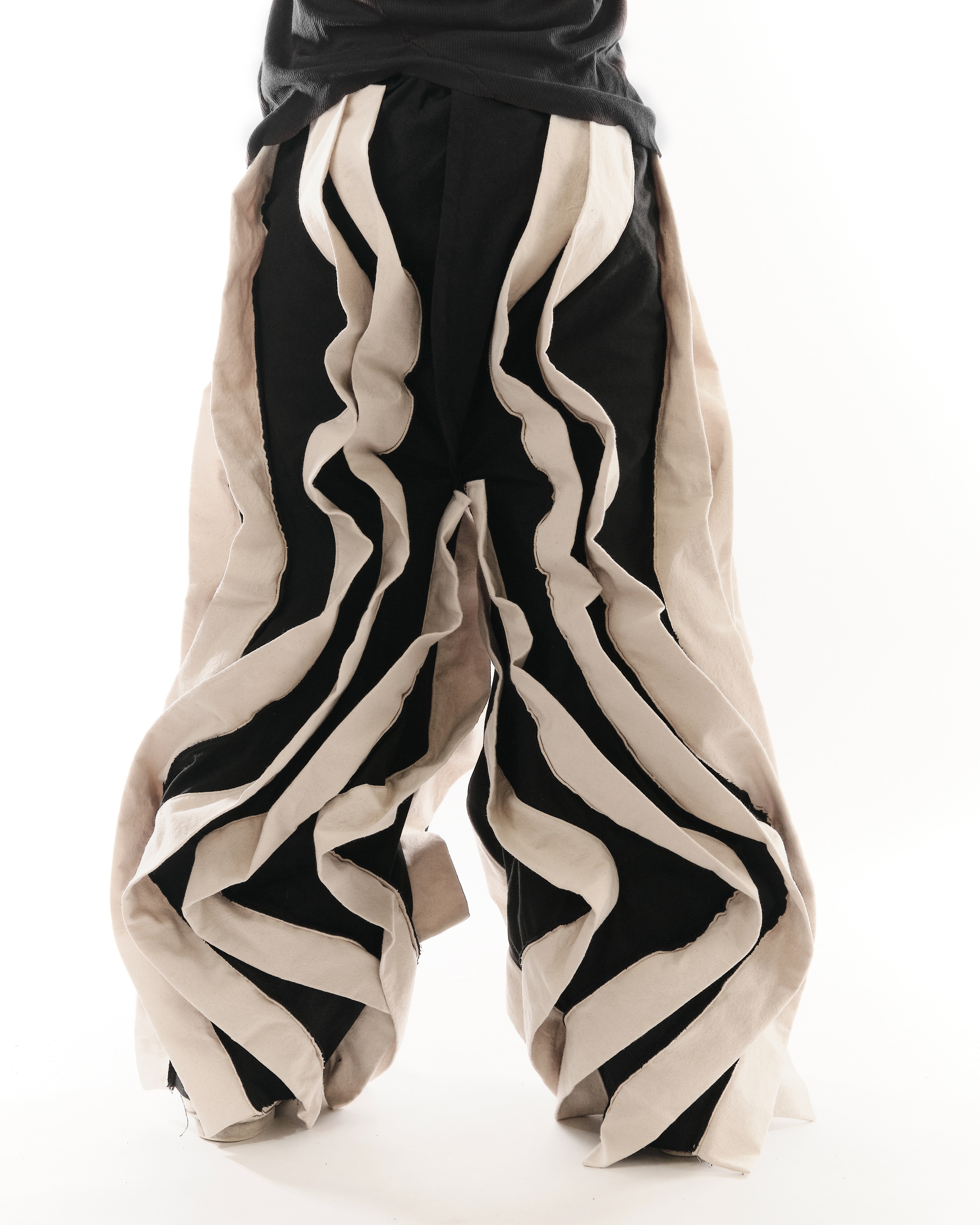 BLACK & WHITE REVERSIBLE POST HUMAN PANTS
