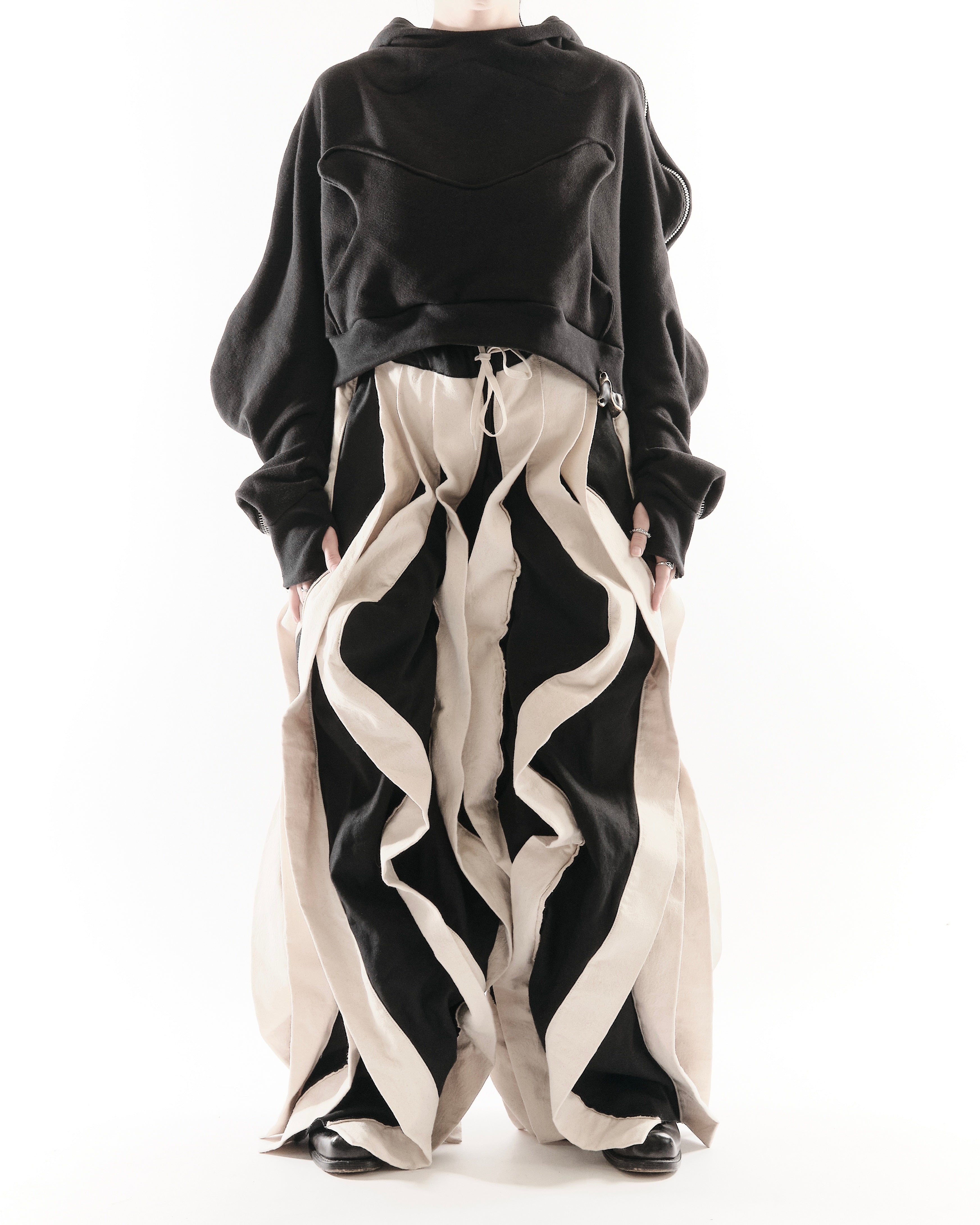 BLACK & WHITE REVERSIBLE POST HUMAN PANTS