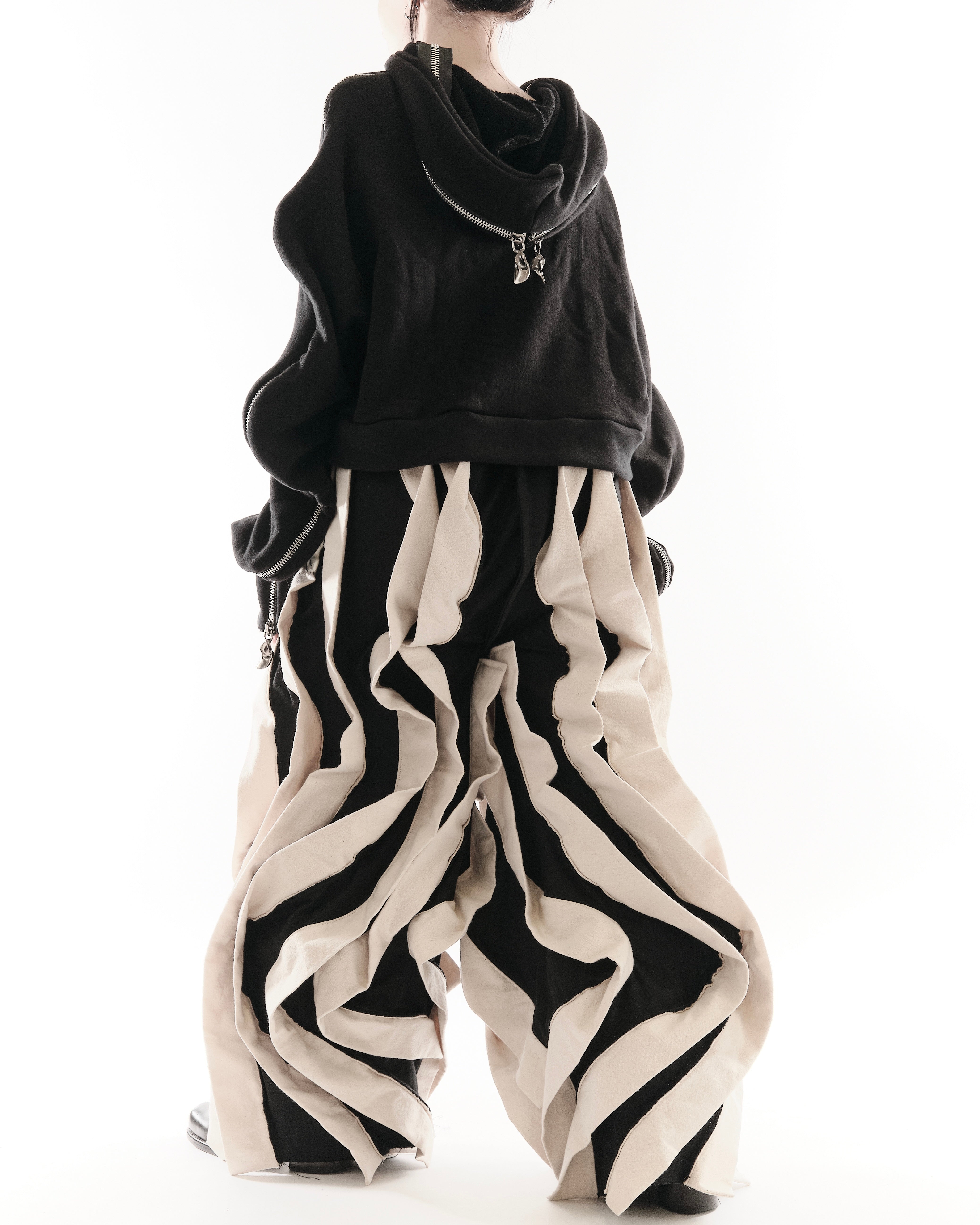 BLACK & WHITE REVERSIBLE POST HUMAN PANTS