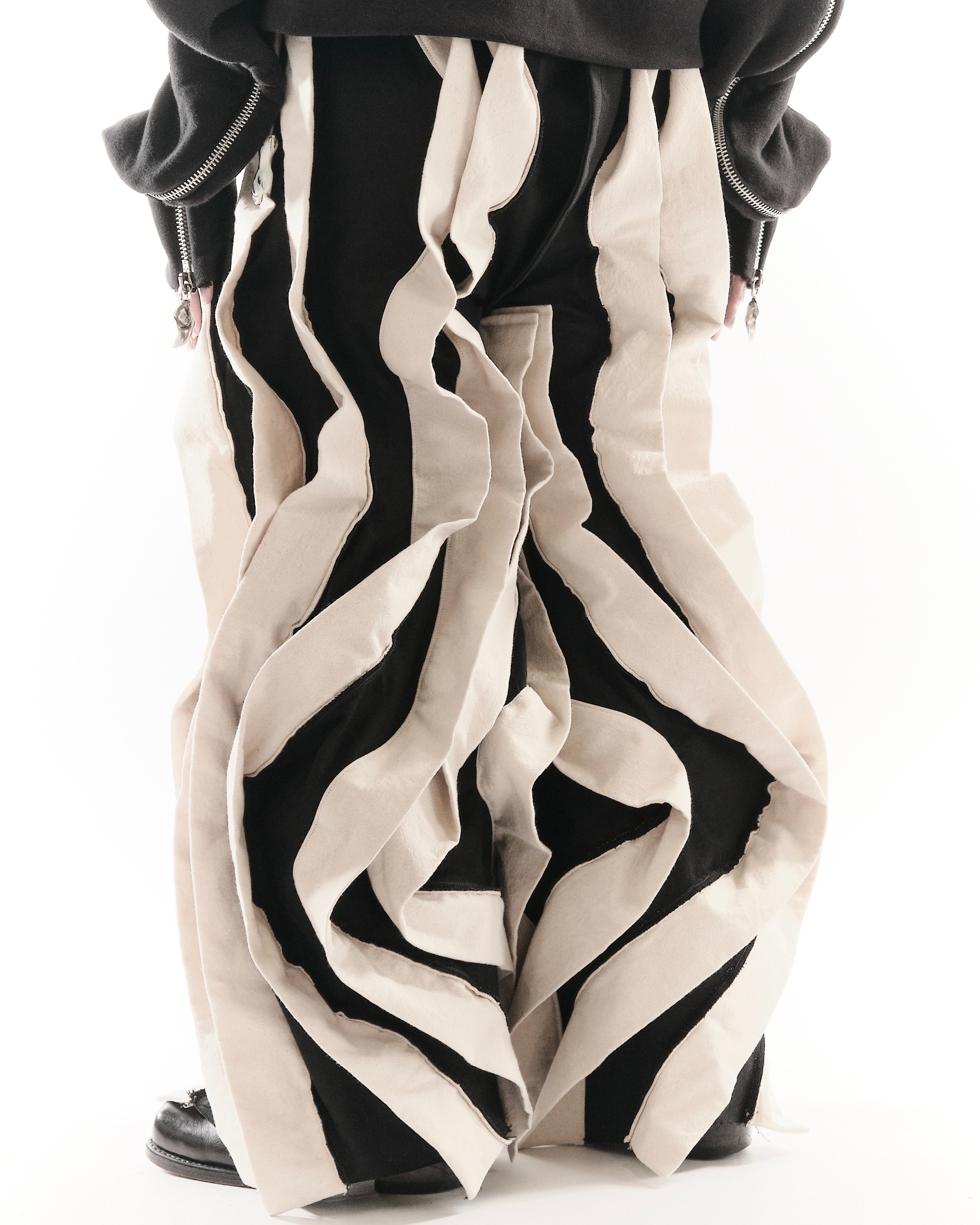 BLACK & WHITE REVERSIBLE POST HUMAN PANTS