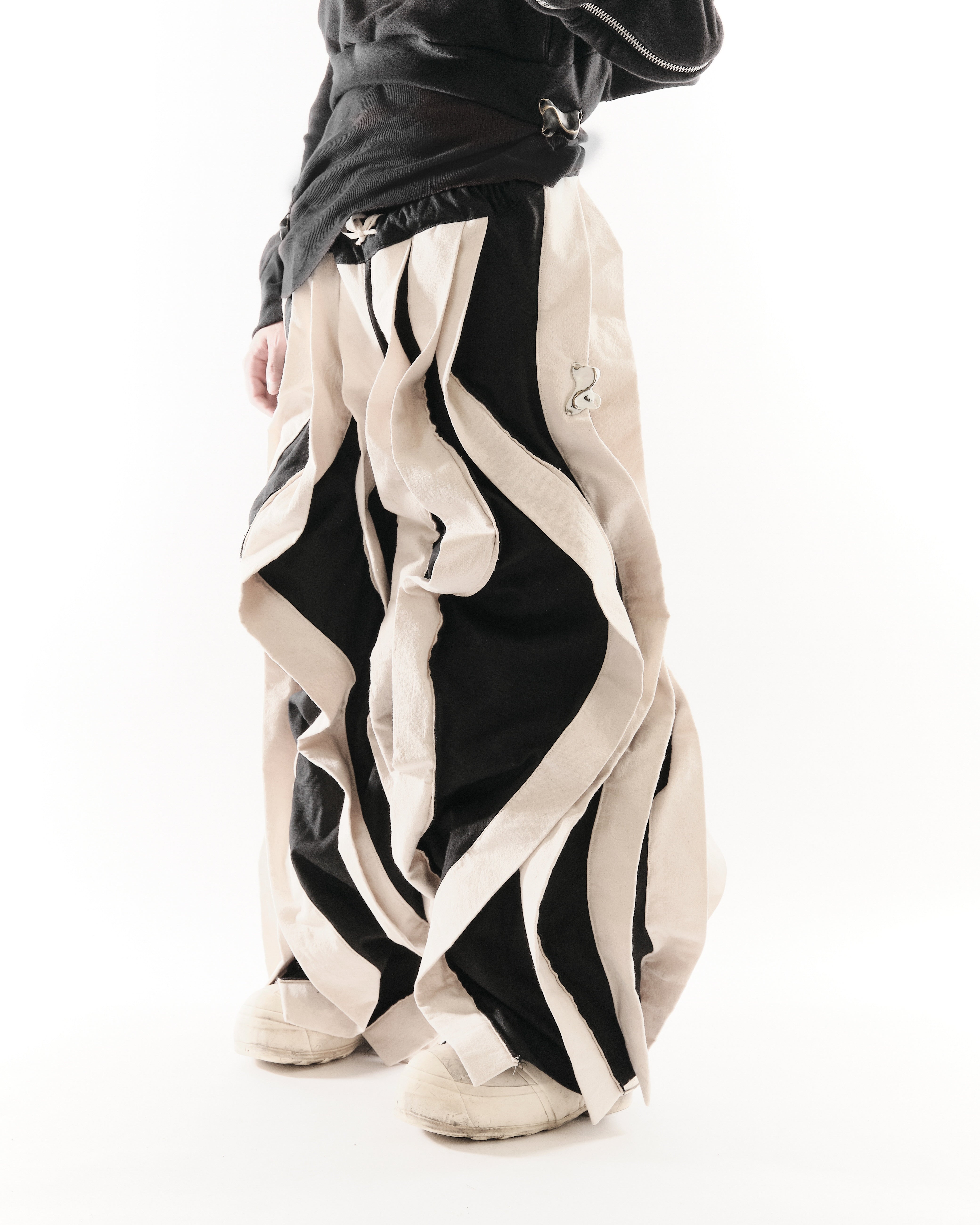 BLACK & WHITE REVERSIBLE POST HUMAN PANTS