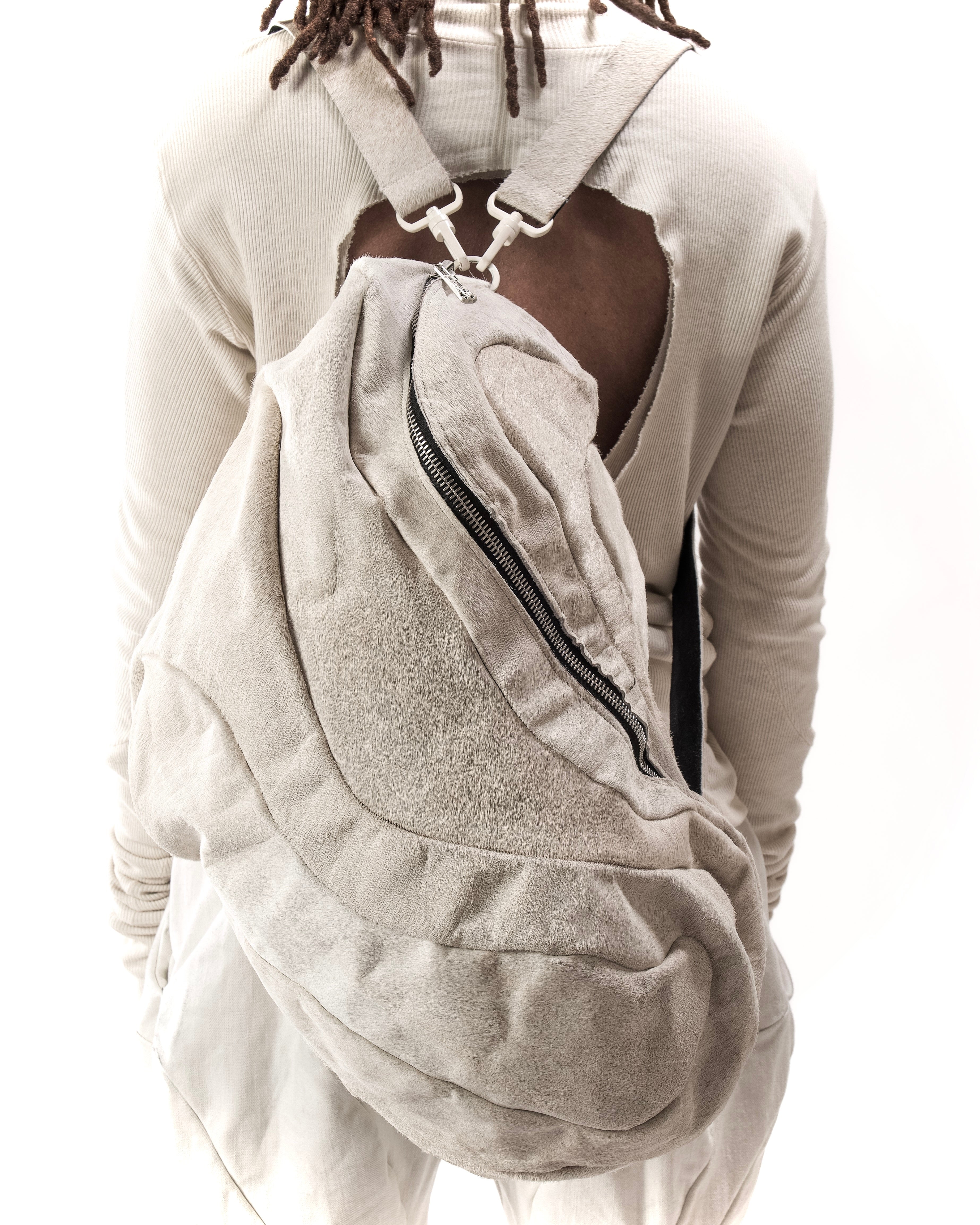 REVERSIBLE LEATHER SCULPTURAL HAIR ON HIDE BAG