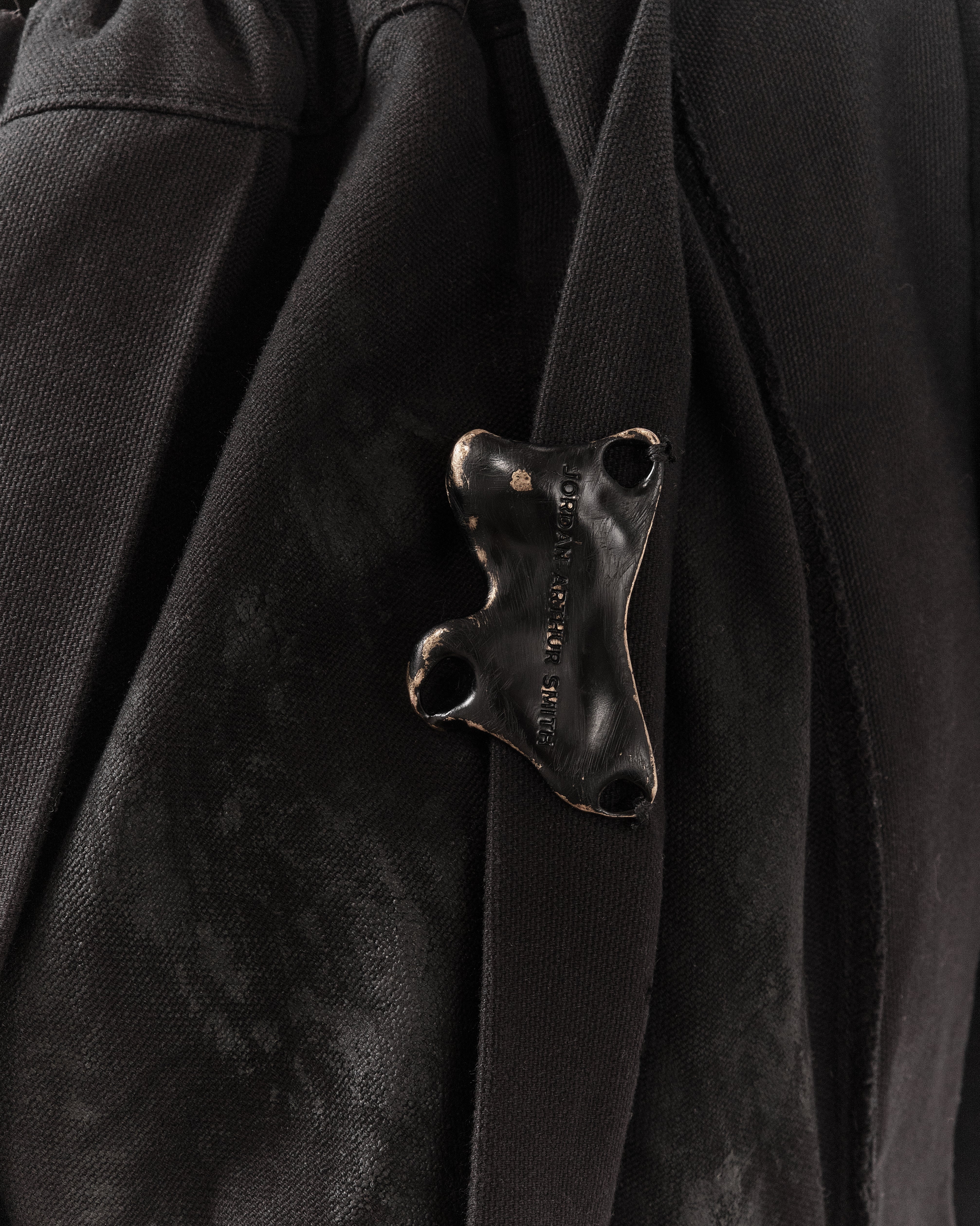 BLACK WAXED REVERSIBLE POST HUMAN PANTS