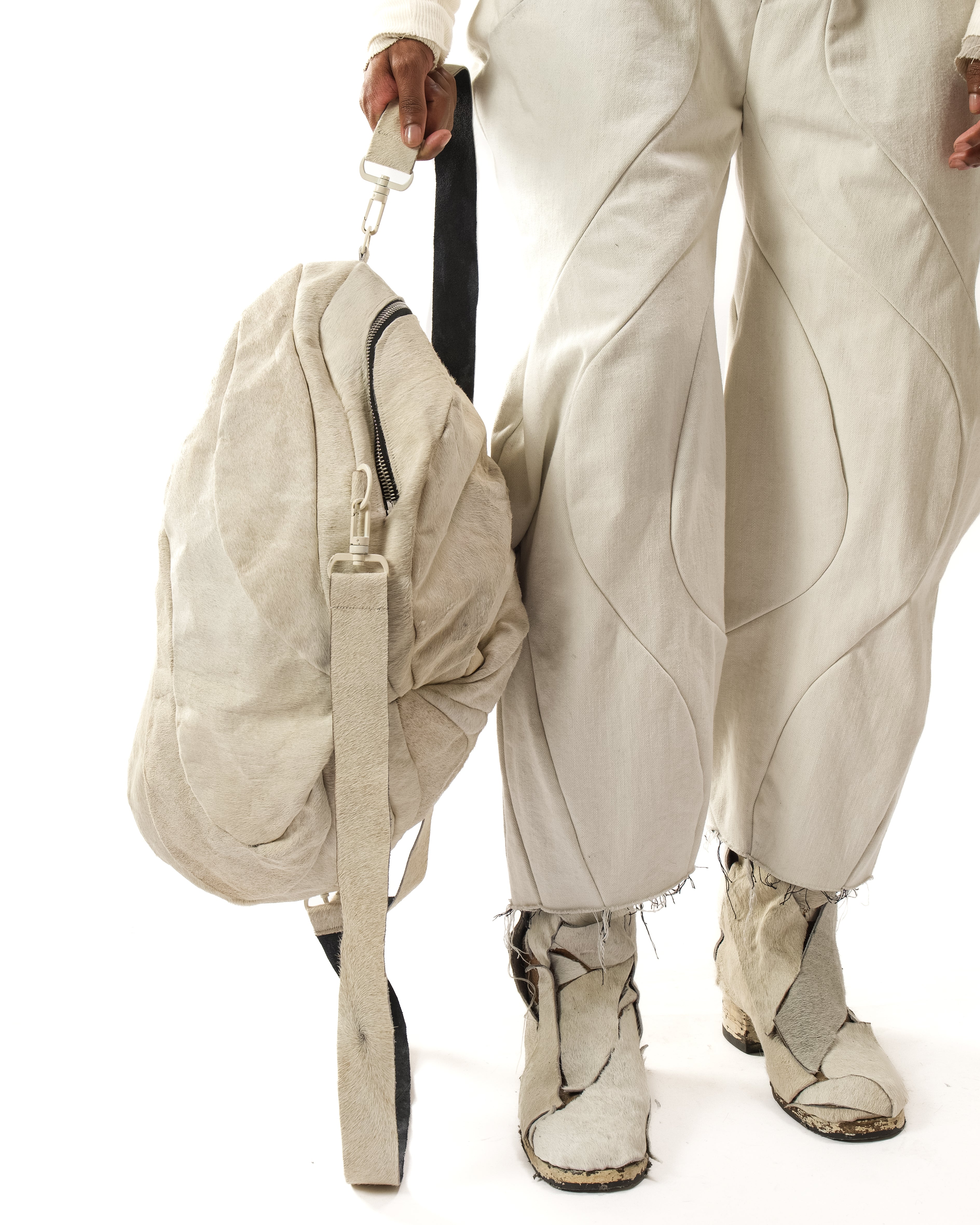 REVERSIBLE LEATHER SCULPTURAL HAIR ON HIDE BAG