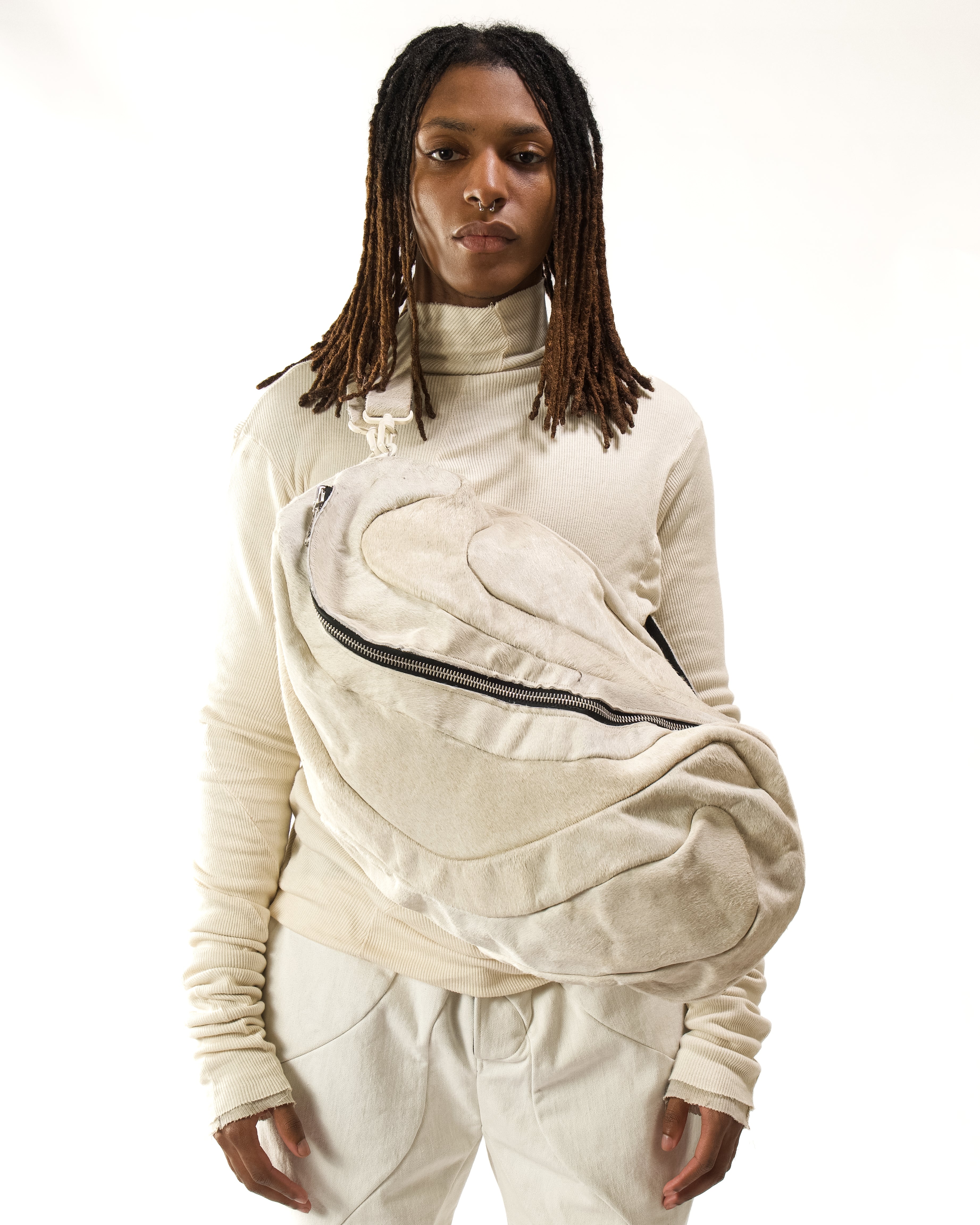 REVERSIBLE LEATHER SCULPTURAL HAIR ON HIDE BAG