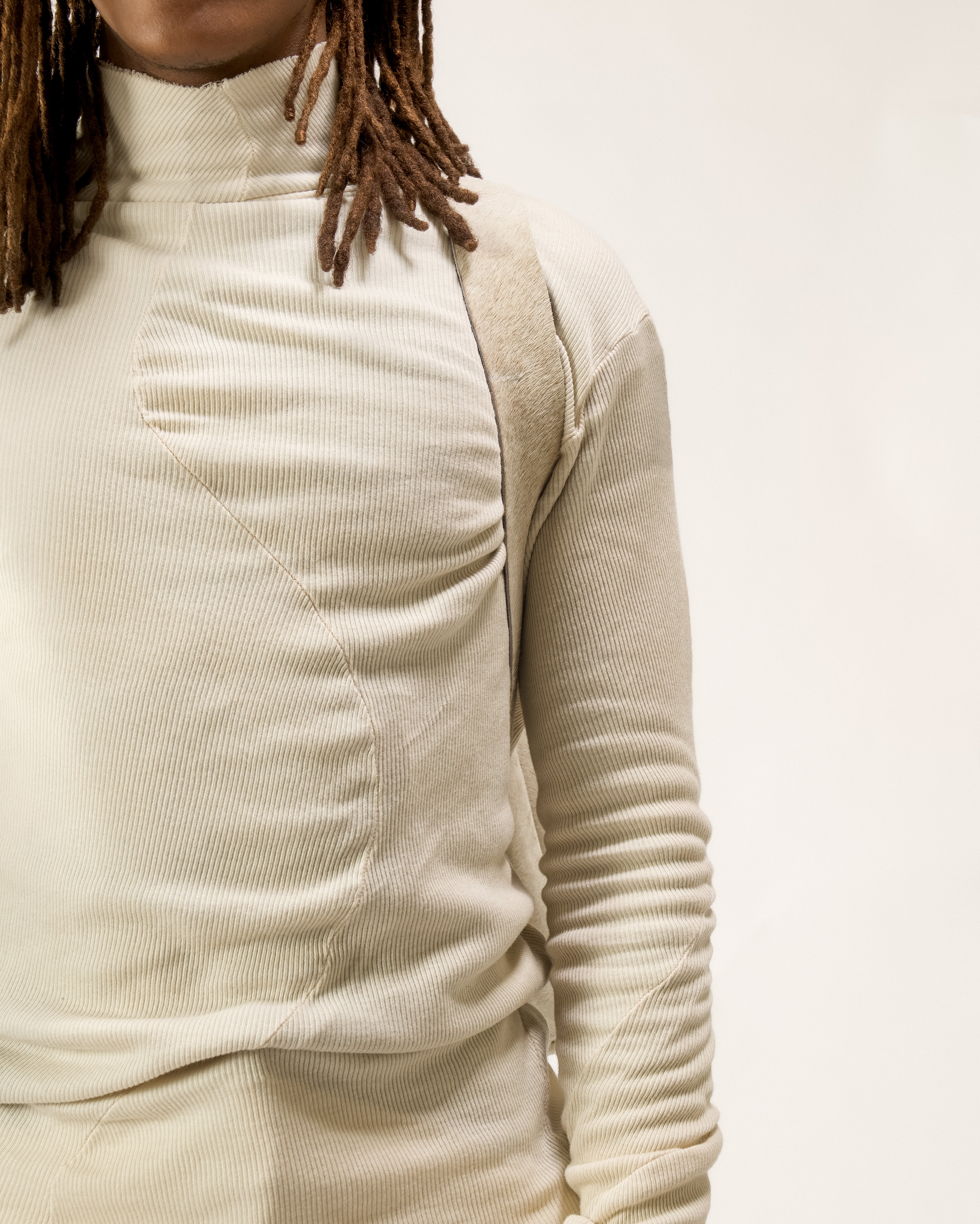 REVERSIBLE LEATHER SCULPTURAL HAIR ON HIDE BAG