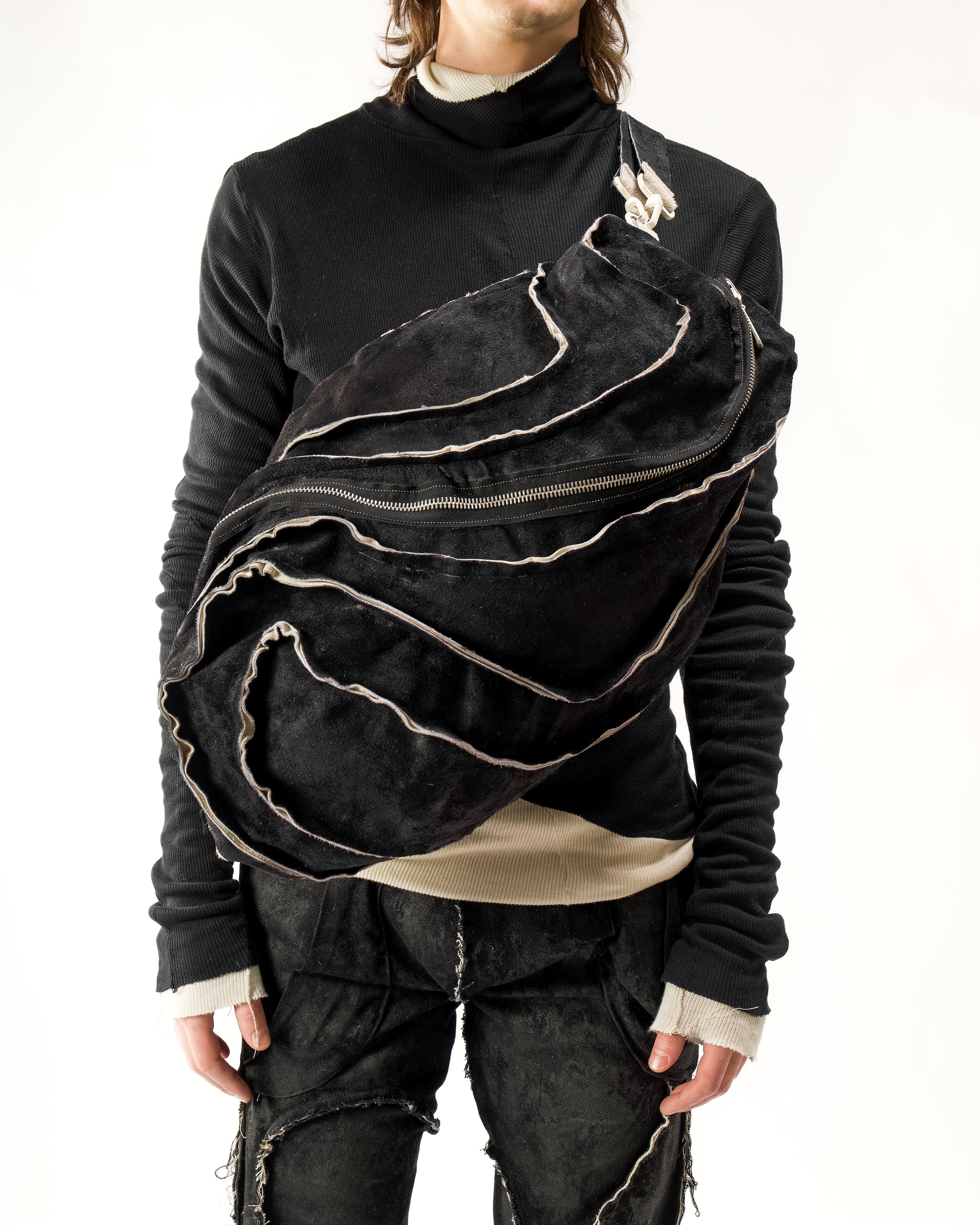 REVERSIBLE LEATHER SCULPTURAL HAIR ON HIDE BAG