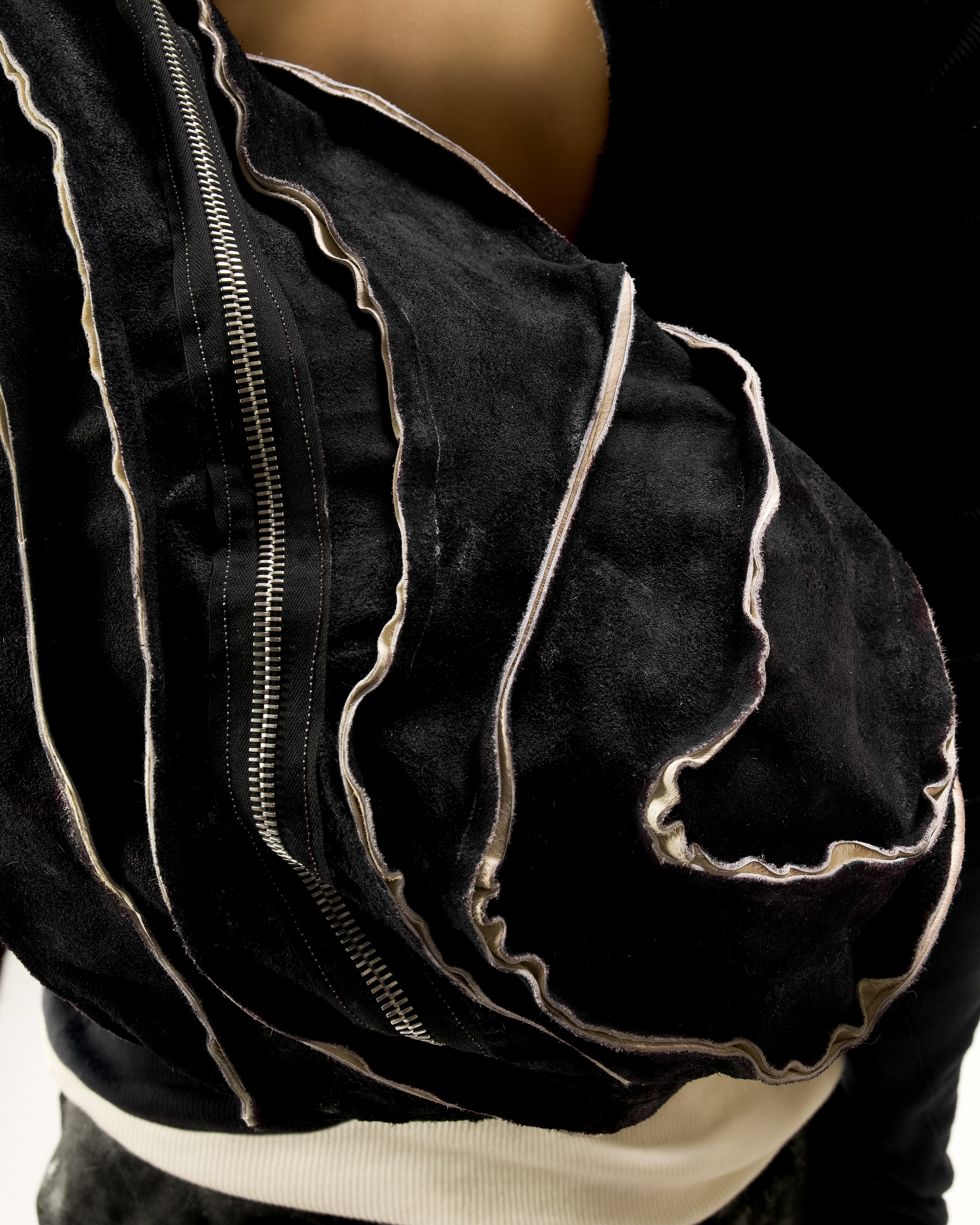 REVERSIBLE LEATHER SCULPTURAL HAIR ON HIDE BAG