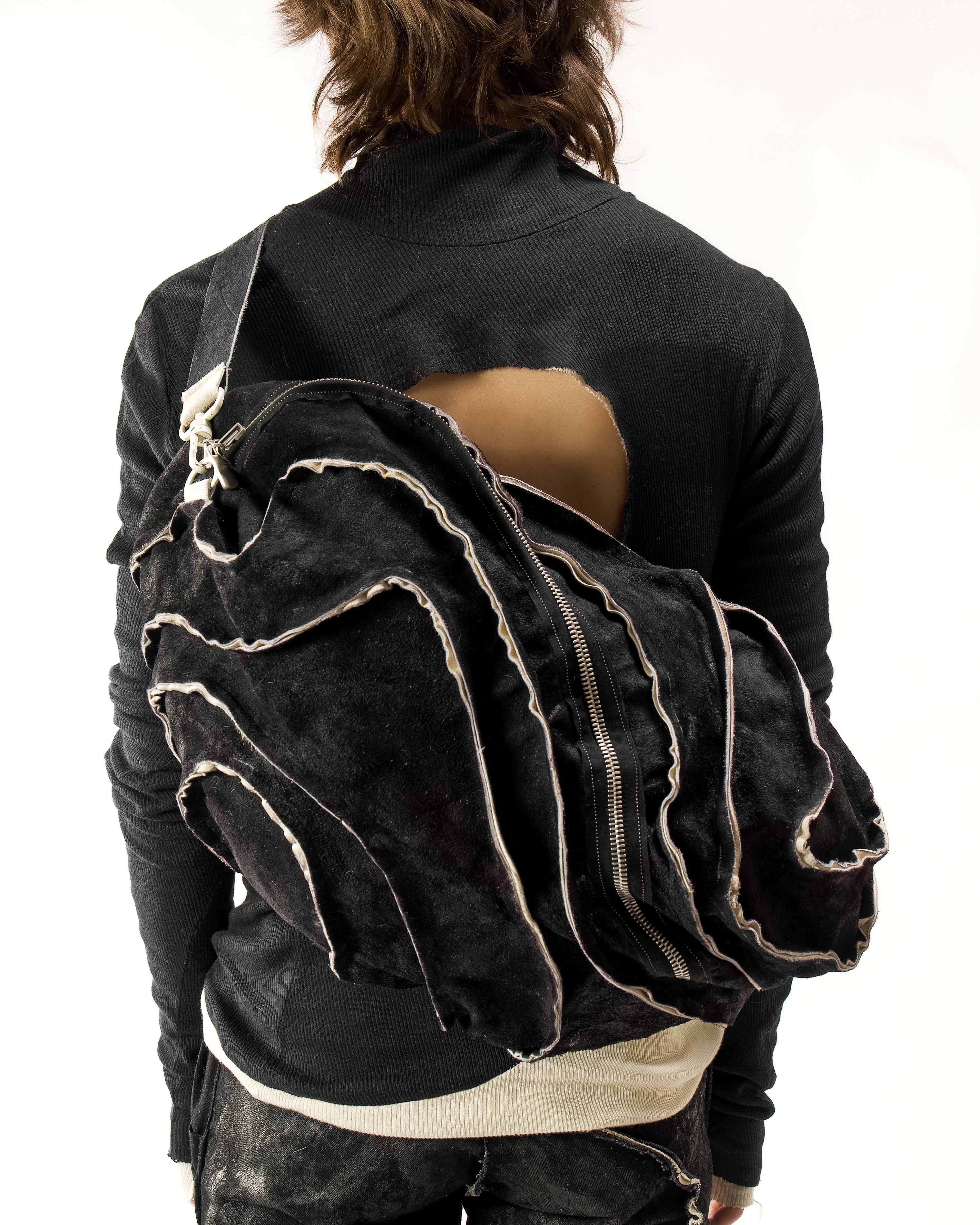 REVERSIBLE LEATHER SCULPTURAL HAIR ON HIDE BAG