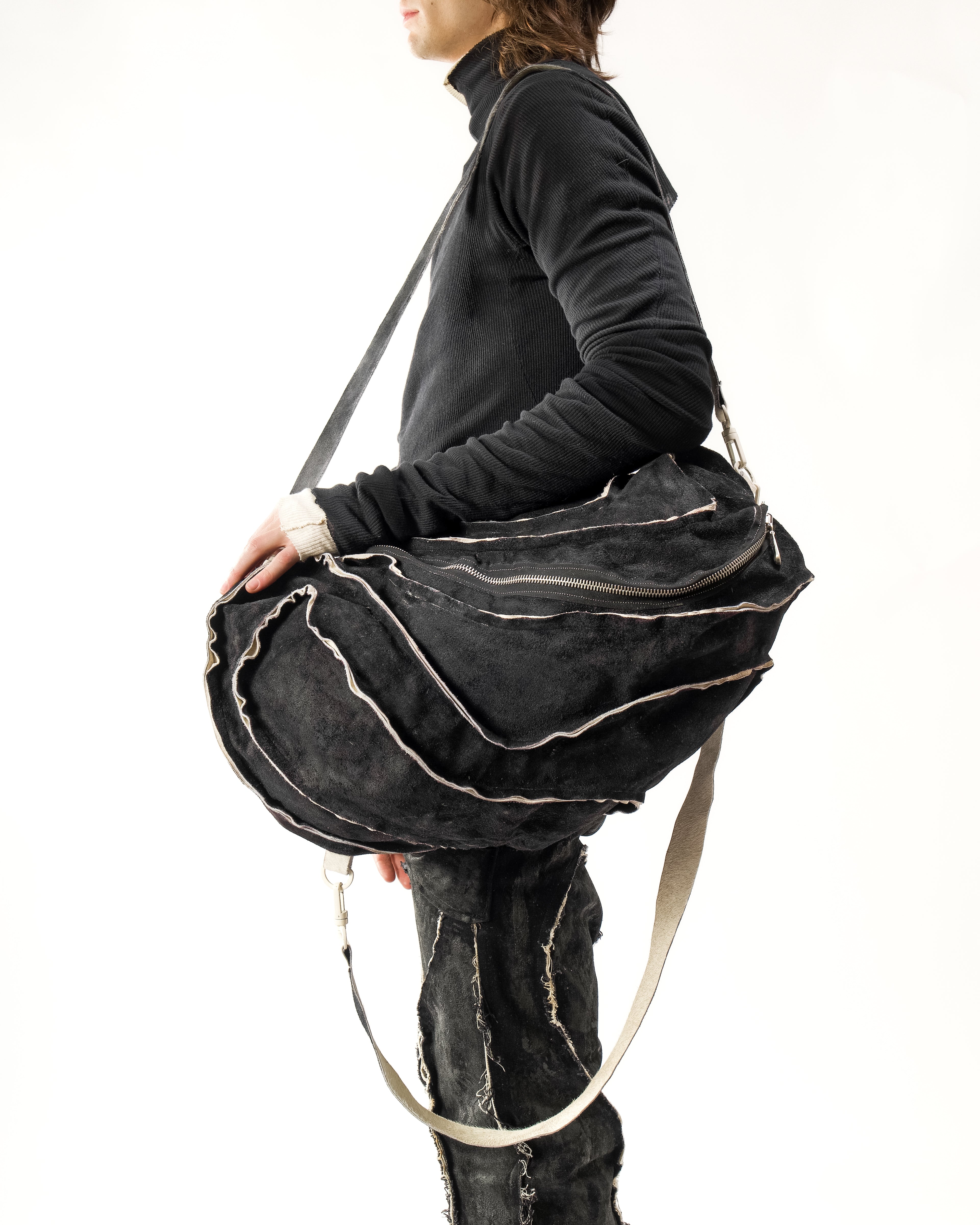 REVERSIBLE LEATHER SCULPTURAL HAIR ON HIDE BAG