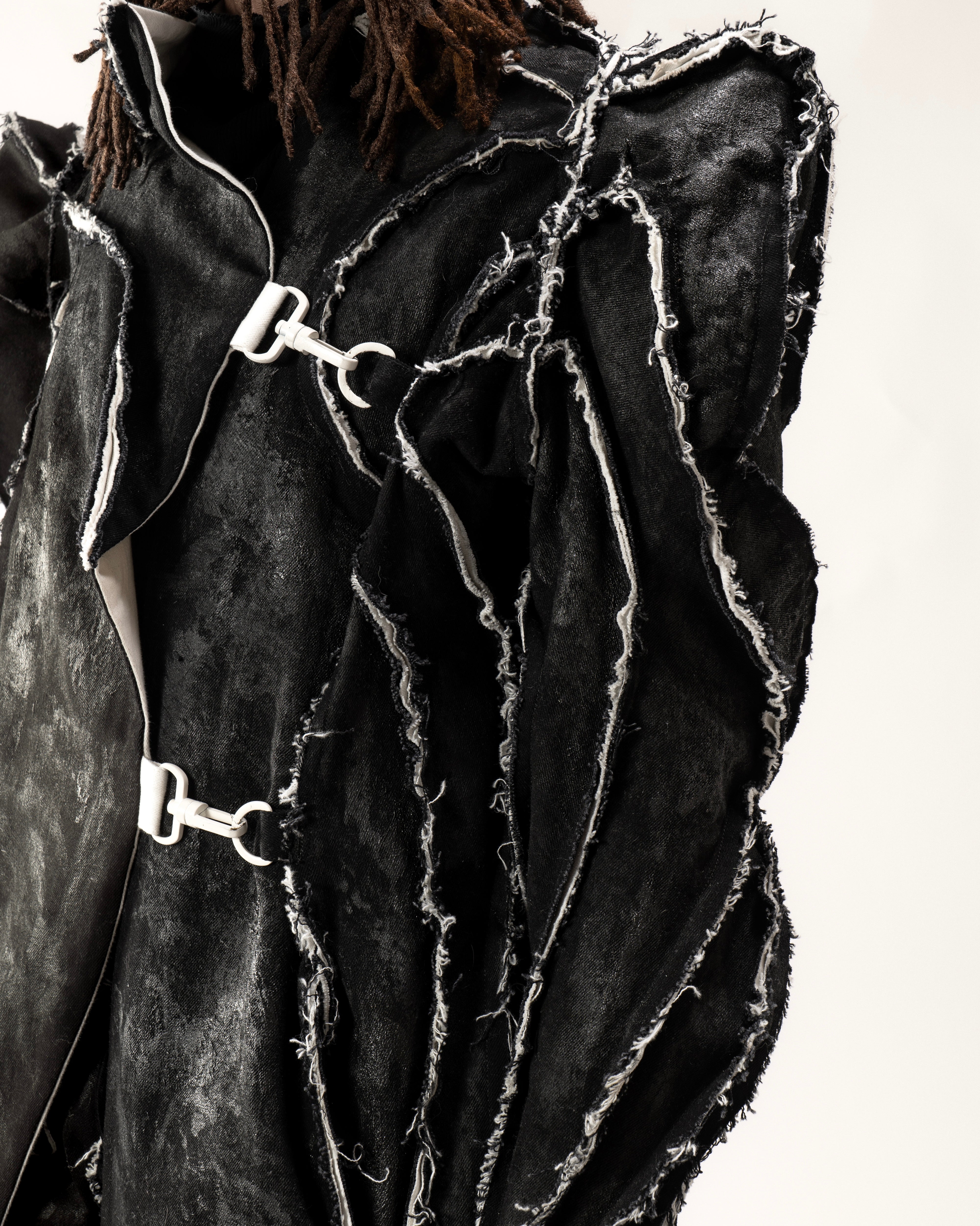 WAXED REVERSIBLE POST HUMAN COAT