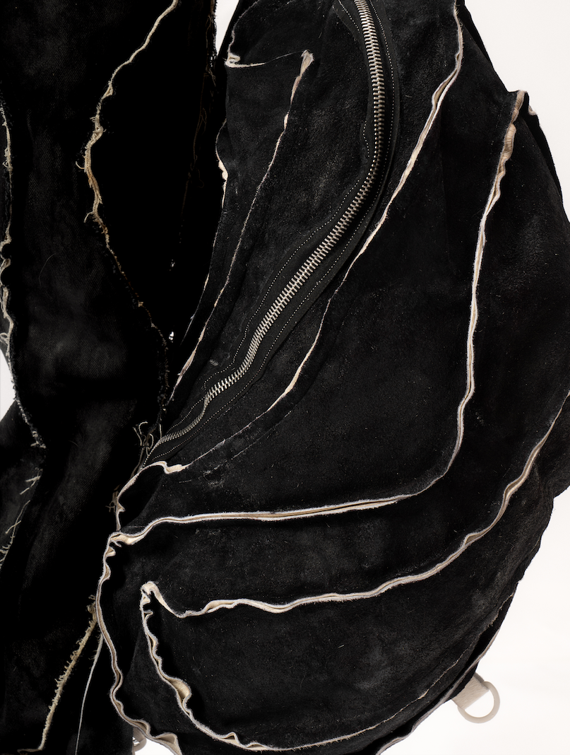 REVERSIBLE LEATHER SCULPTURAL HAIR ON HIDE BAG