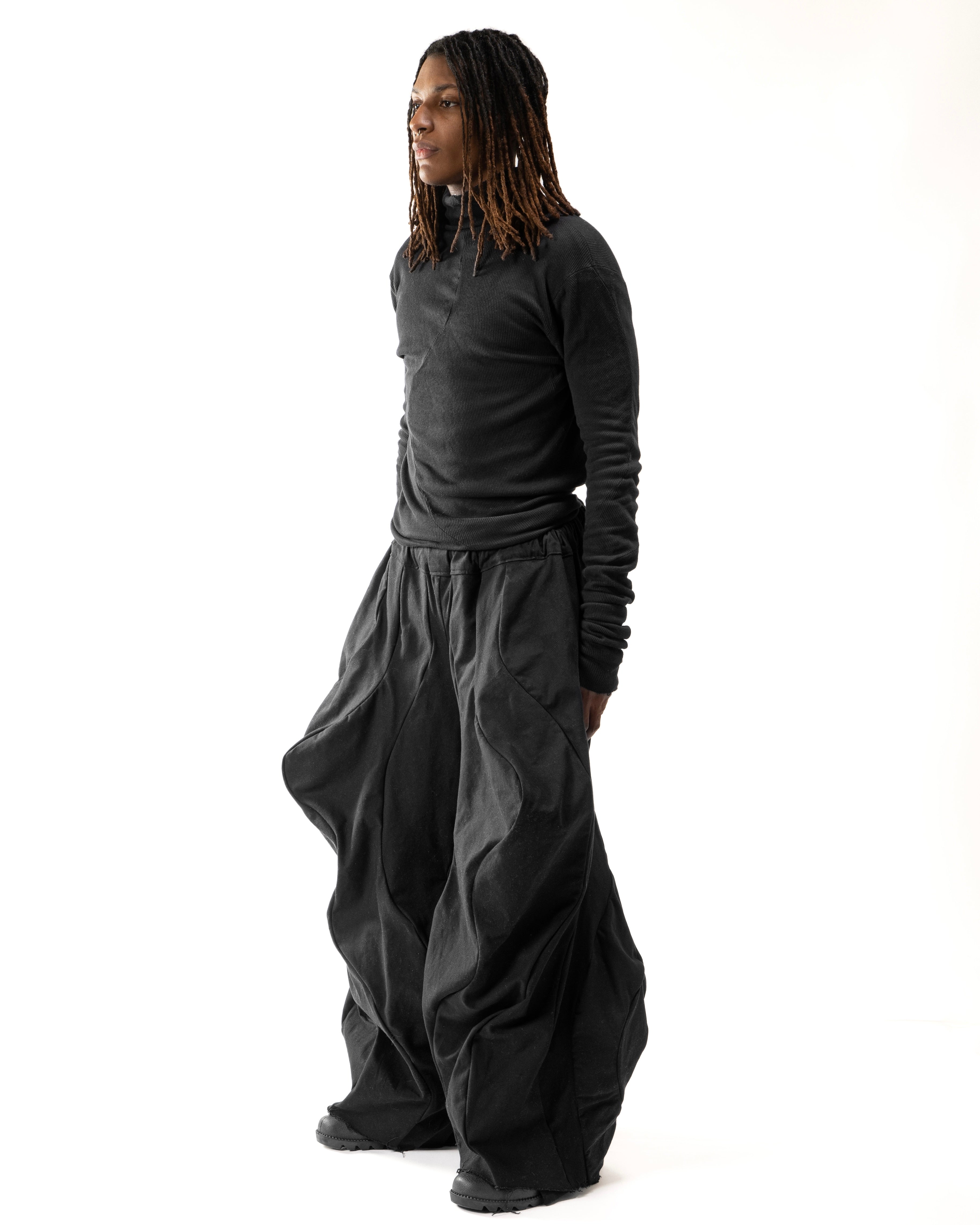 BLACK WAXED REVERSIBLE POST HUMAN PANTS