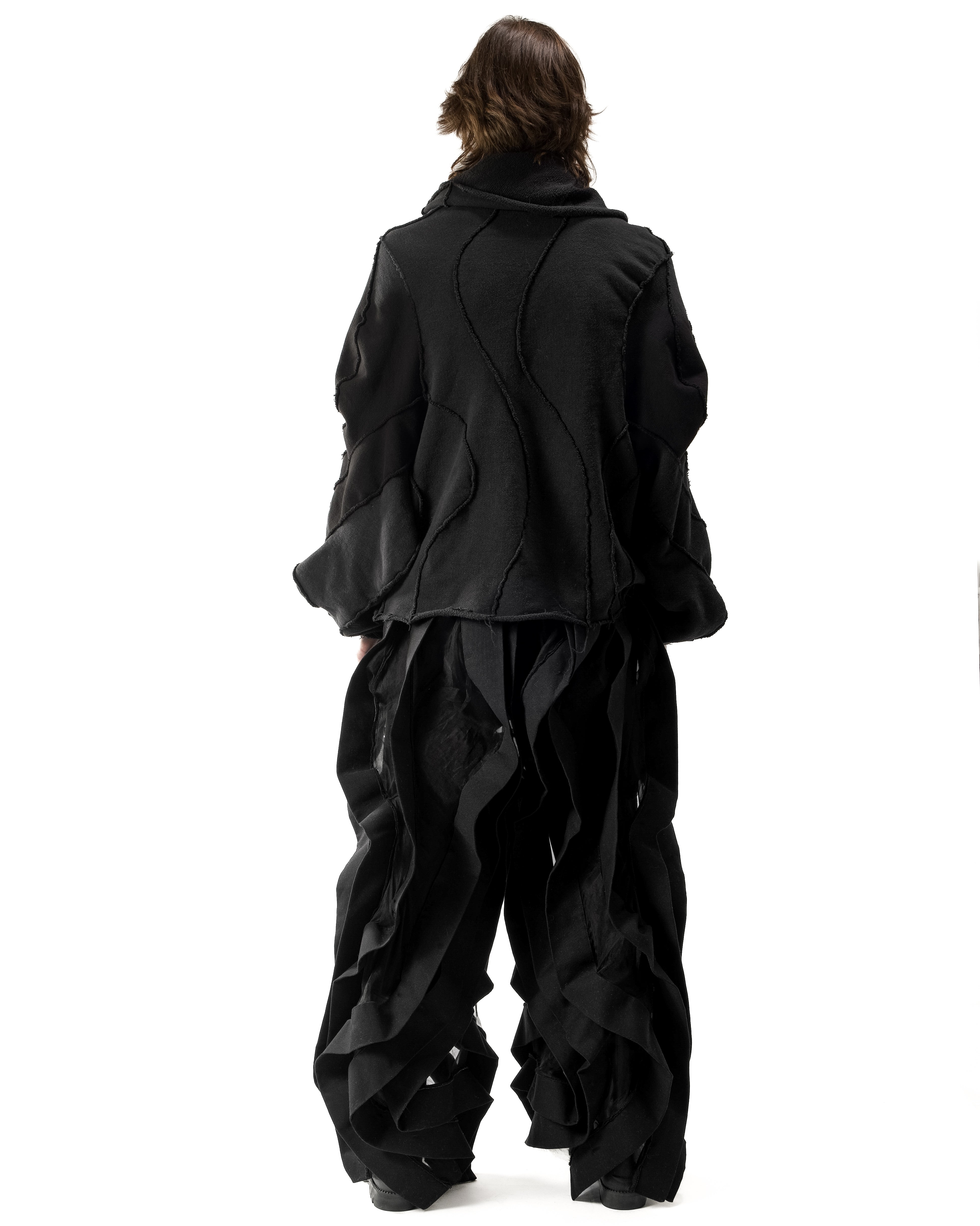 BLACK REVERSIBLE SHEER POST HUMAN PANTS