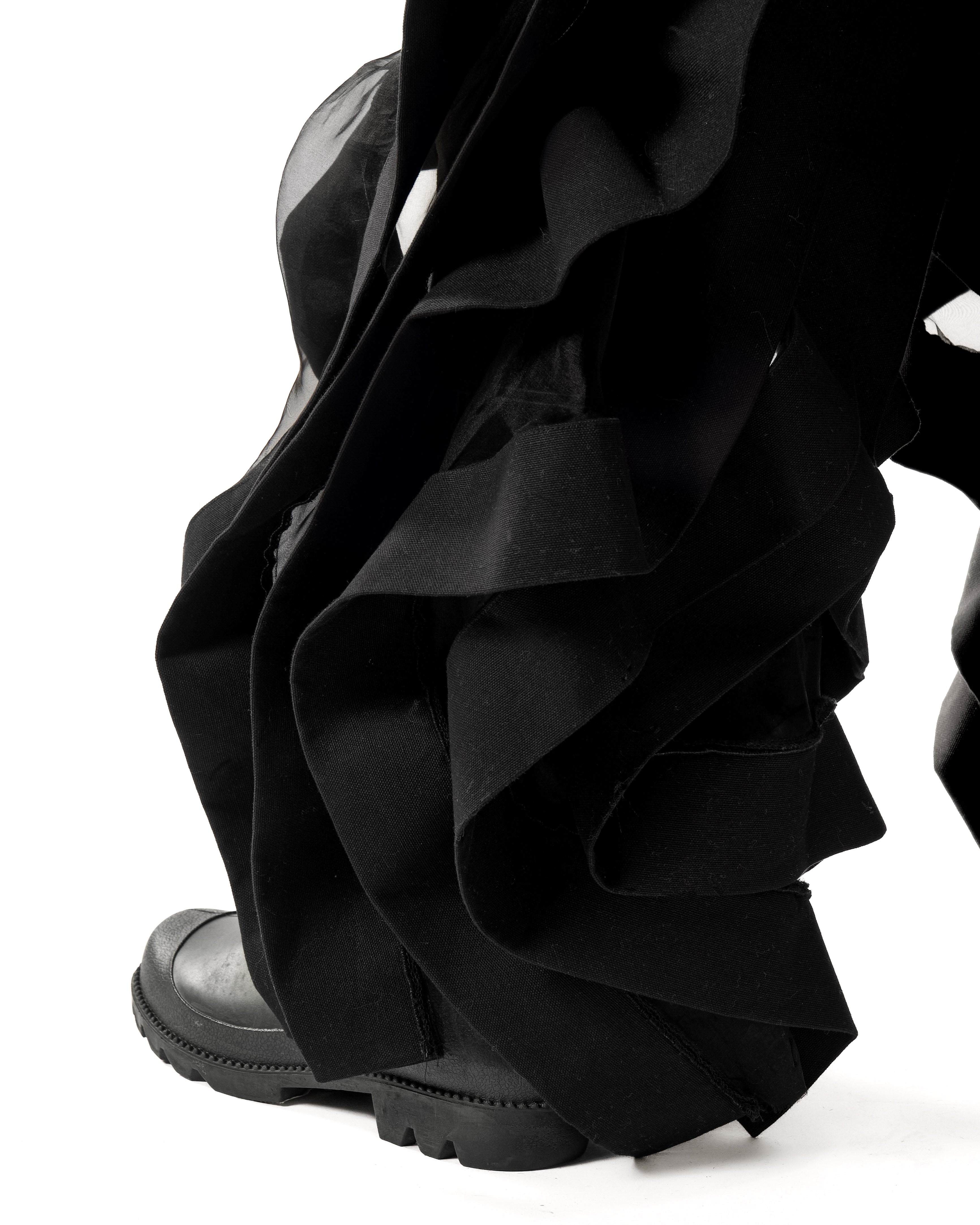 BLACK REVERSIBLE SHEER POST HUMAN PANTS