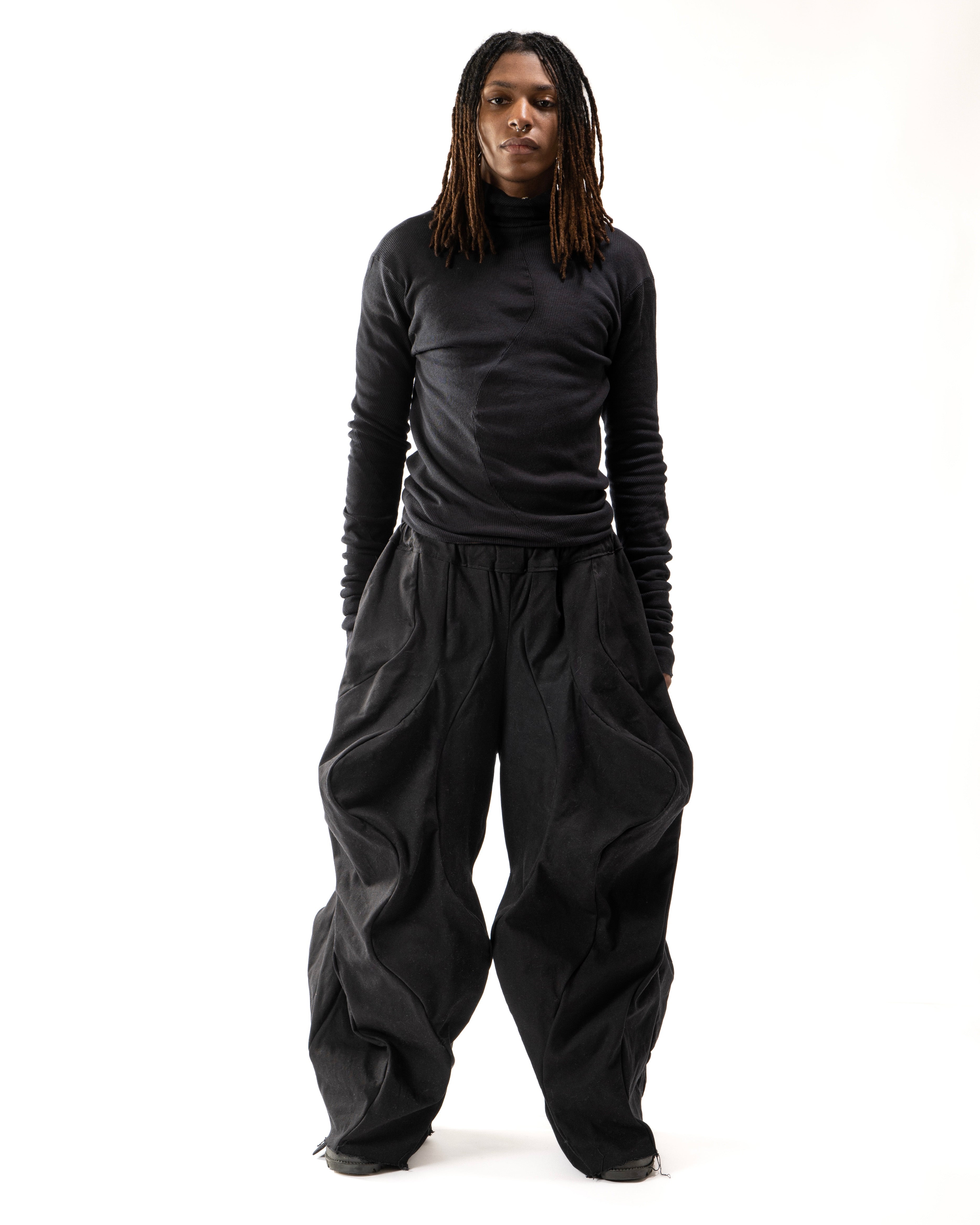 BLACK WAXED REVERSIBLE POST HUMAN PANTS