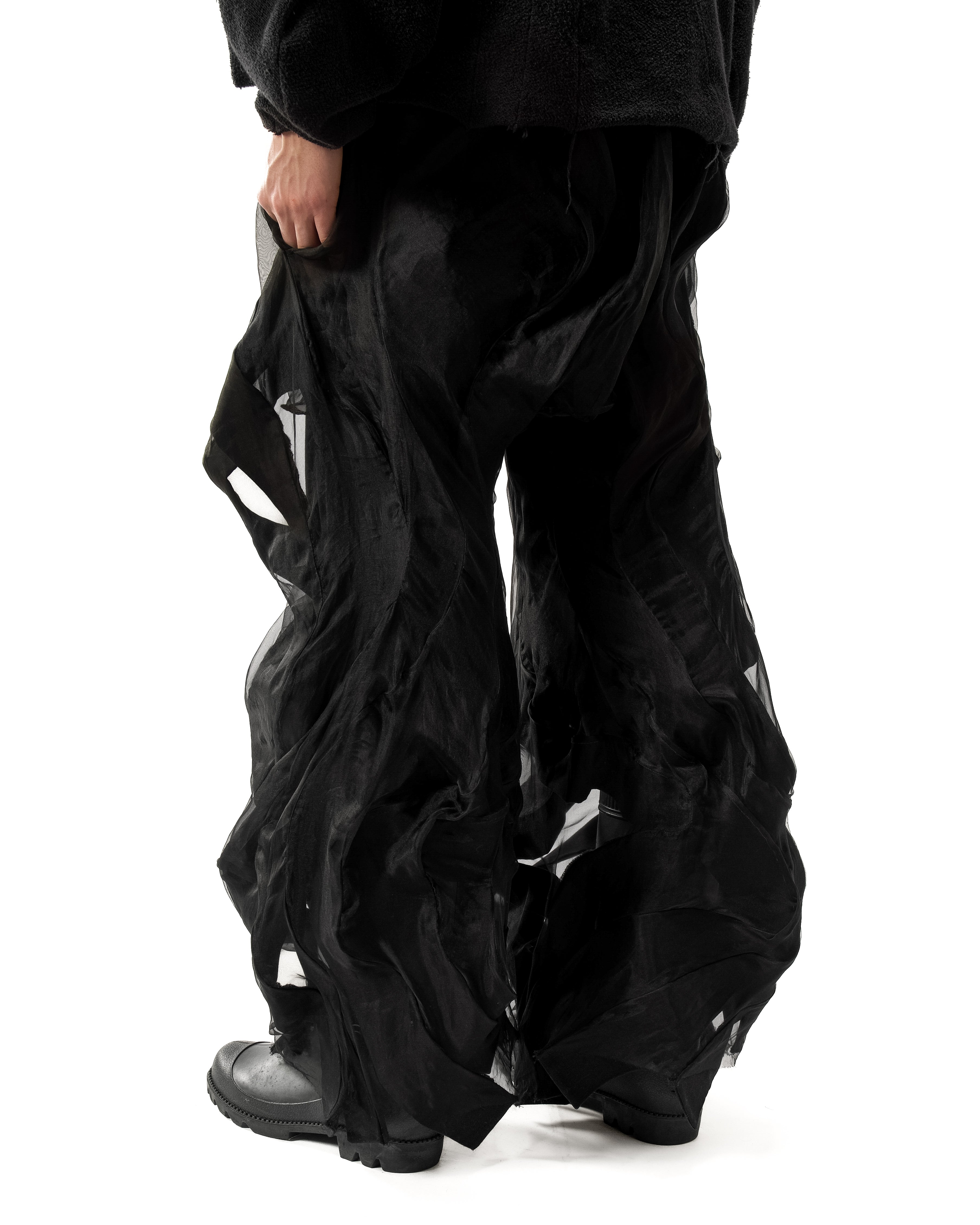 BLACK REVERSIBLE SHEER POST HUMAN PANTS
