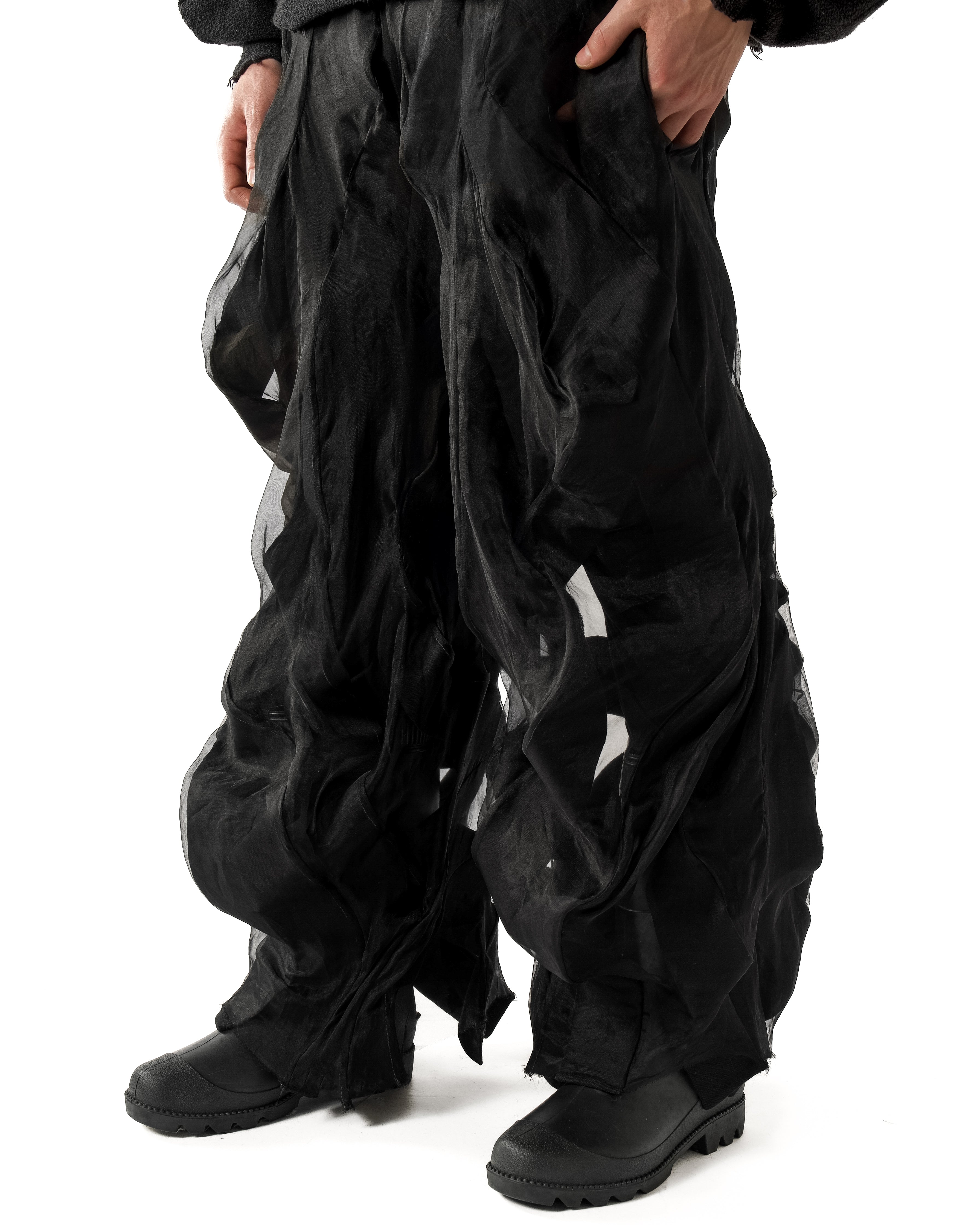 BLACK REVERSIBLE SHEER POST HUMAN PANTS