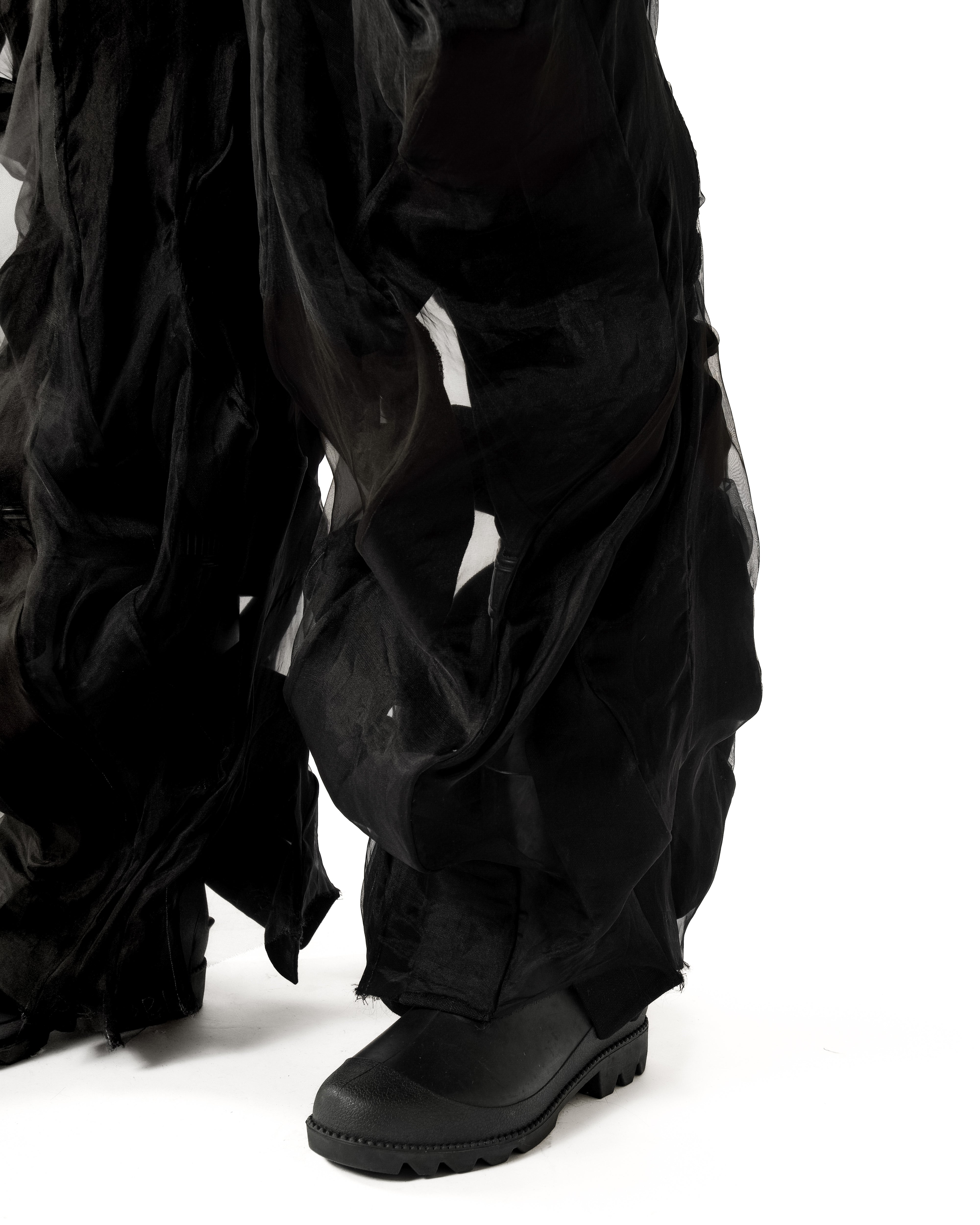 BLACK REVERSIBLE SHEER POST HUMAN PANTS