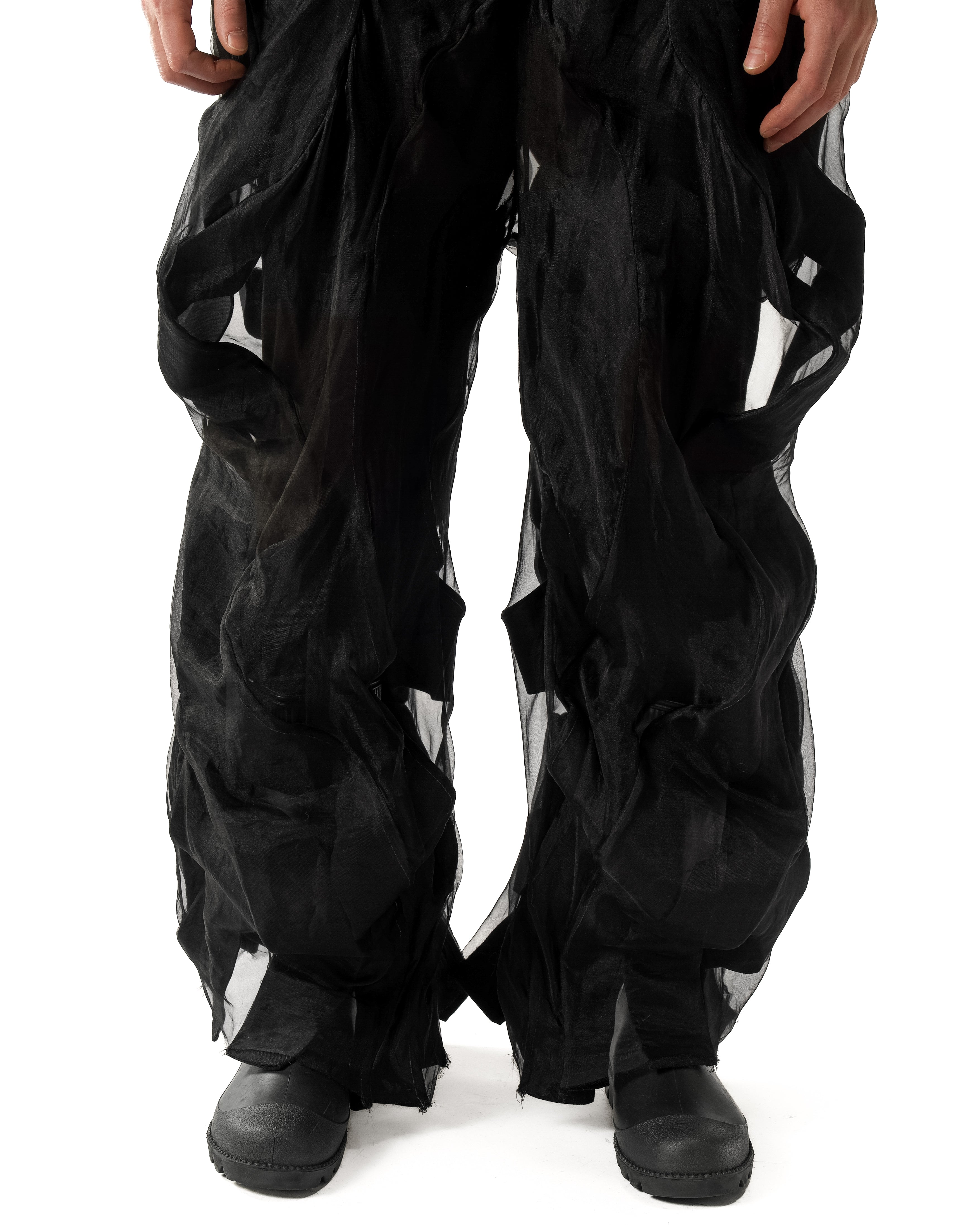 BLACK REVERSIBLE SHEER POST HUMAN PANTS